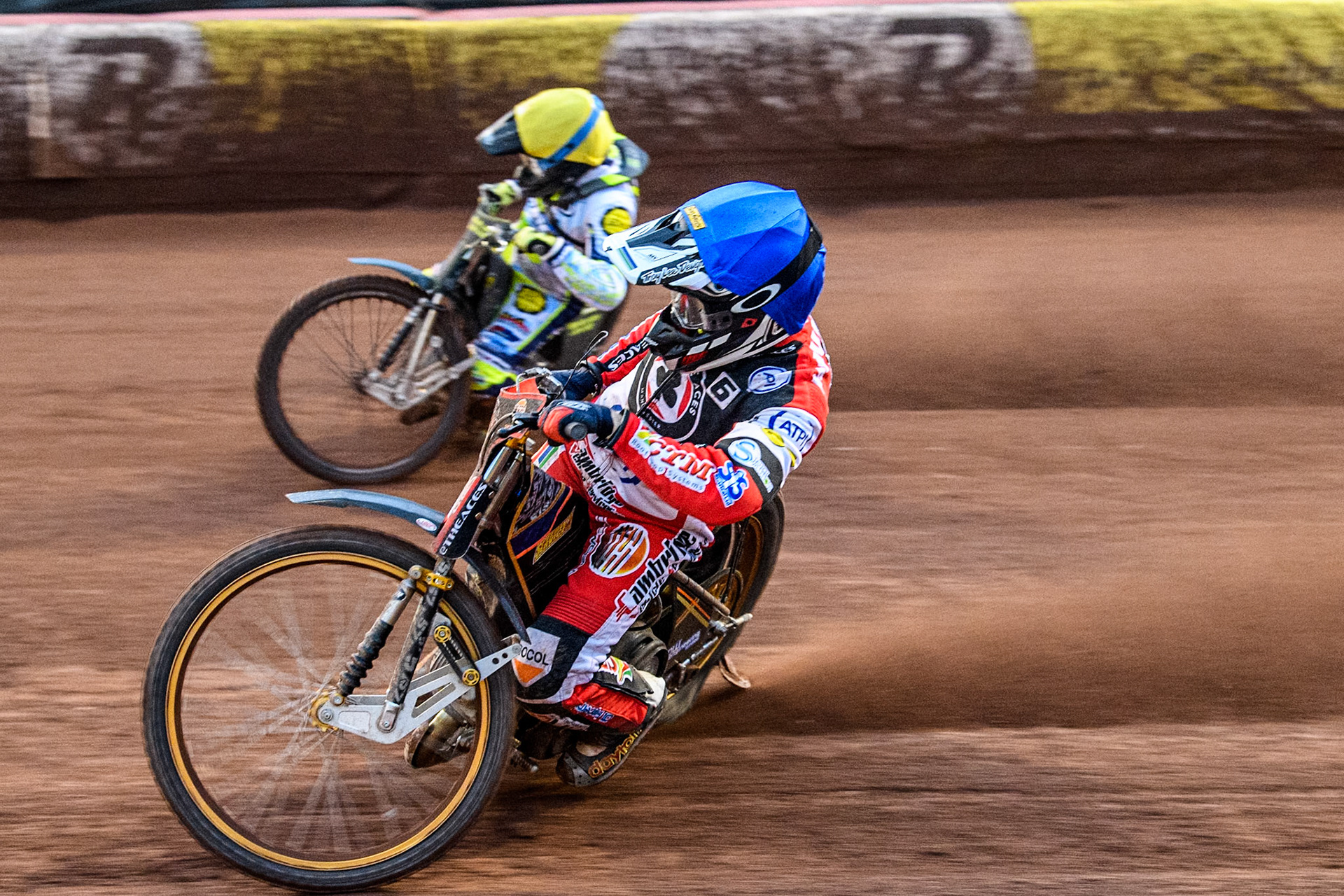 Belle Vue Aces' Connor Mountain in Blue rides inside Oxford Spires' Craig Cook in Yellow during the Rowe Motor Oil Premiership match between Belle Vue Aces and Oxford Spires at the National Speedway Stadium, Manchester on Monday 13th May 2024. (Photo: Ian Charles | MI News)