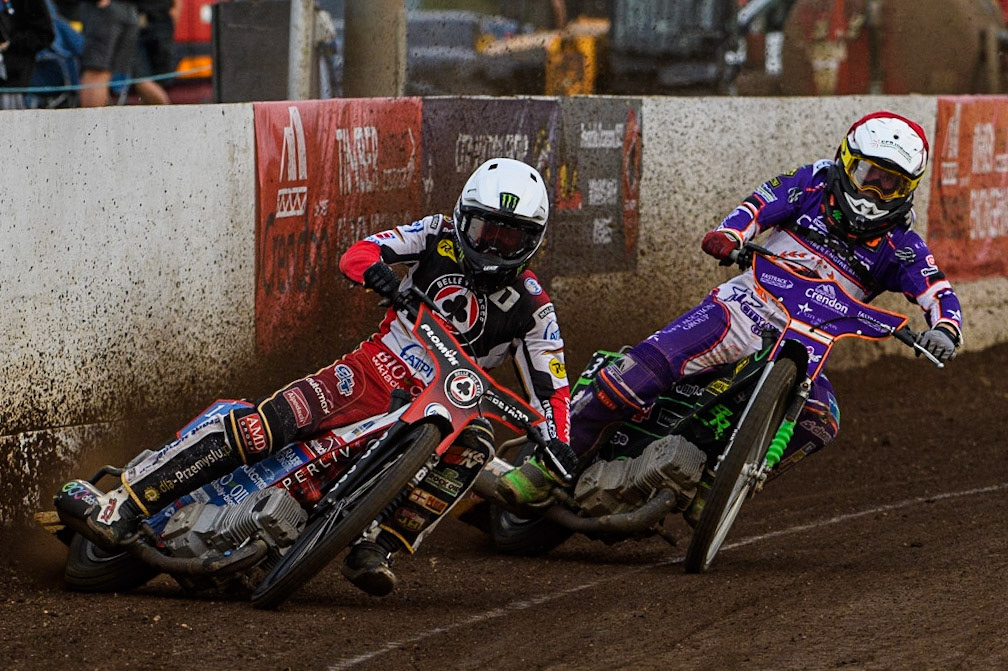 Dan Bewley (White) leads Benjamin Basso (Red) during the Sports Insure Premiership match between Peterborough and Belle Vue Aces at East of England Showground, Peterborough on Monday 26th June 2023. (Photo: Ian Charles | MI News)