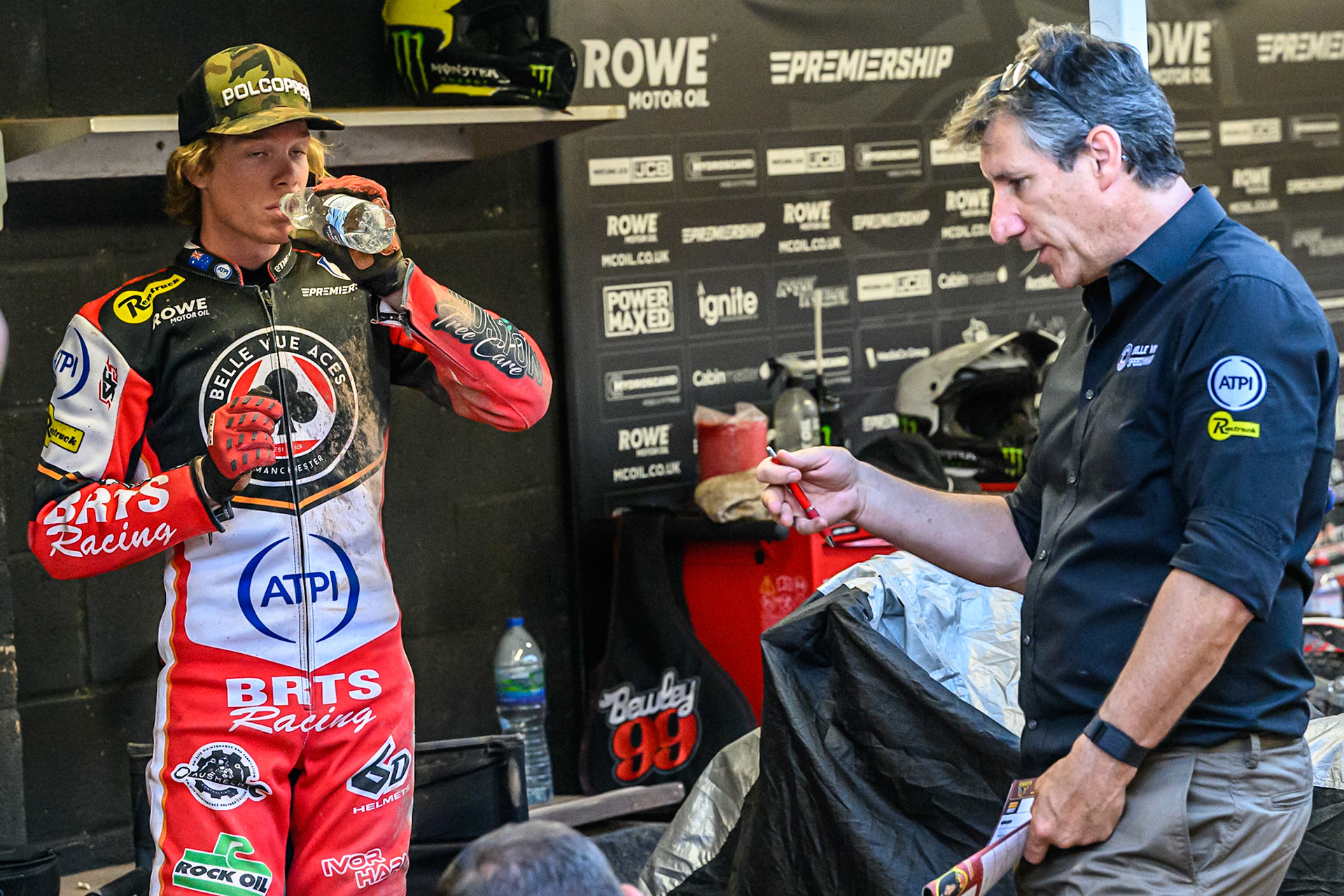 Belle Vue Aces' Tate Zischke (Left) with Belle Vue Aces' Team Manager Mark Lemon during the Rowe Motor Oil Premiership match between Leicester Lions and Belle Vue Aces at the Hydroscand Arena, Leicester on Thursday 19th June 2025. (Photo: Ian Charles | MI News)
