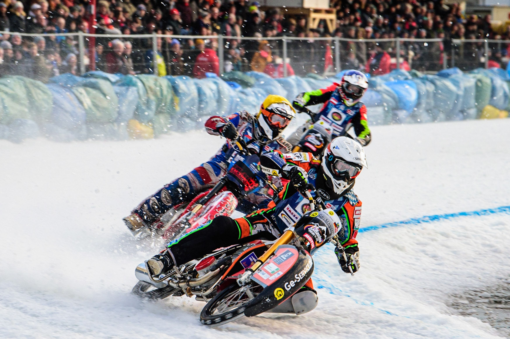 Markus Jell (White) leads Jan Klatovsky (Yellow) and Harald Simon (Blue) during the German Individual Ice Speedway Championship at Horst-Dohm-Eisstadion, Berlin on Friday 3rd March 2023. (Photo: Ian Charles | MI News)