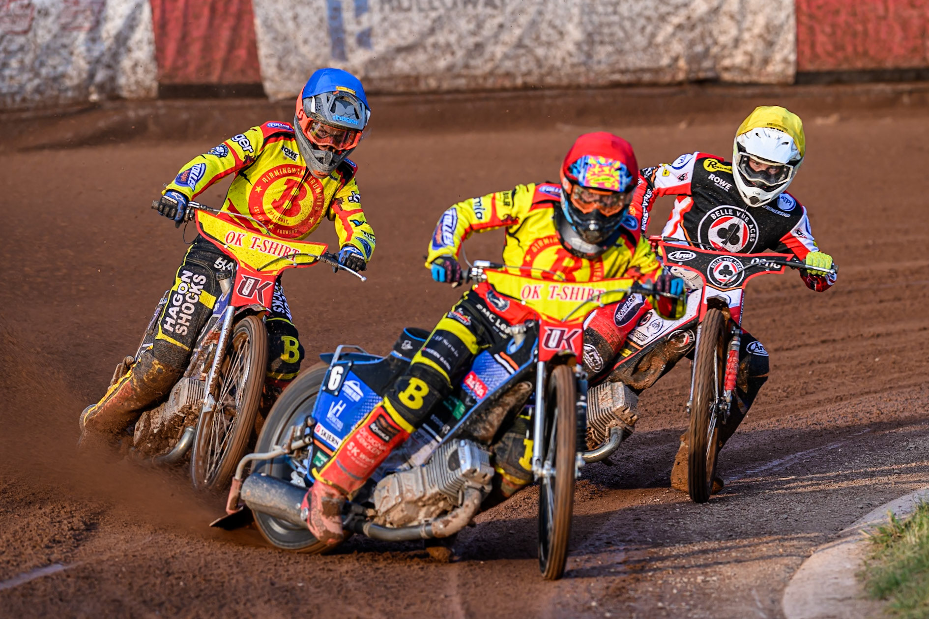 Birmingham Brummies' Jonas Jeppesen in Red leading Birmingham Brummies' Jason Edwards in Blue and Belle Vue Aces' Jake Mulford in Yellow during the Rowe Motor Oil Premiership match between Birmingham Brummies and Belle Vue Aces at Perry Bar Stadium, Birmingham on Monday 2nd June 2025. (Photo: Ian Charles | MI News)