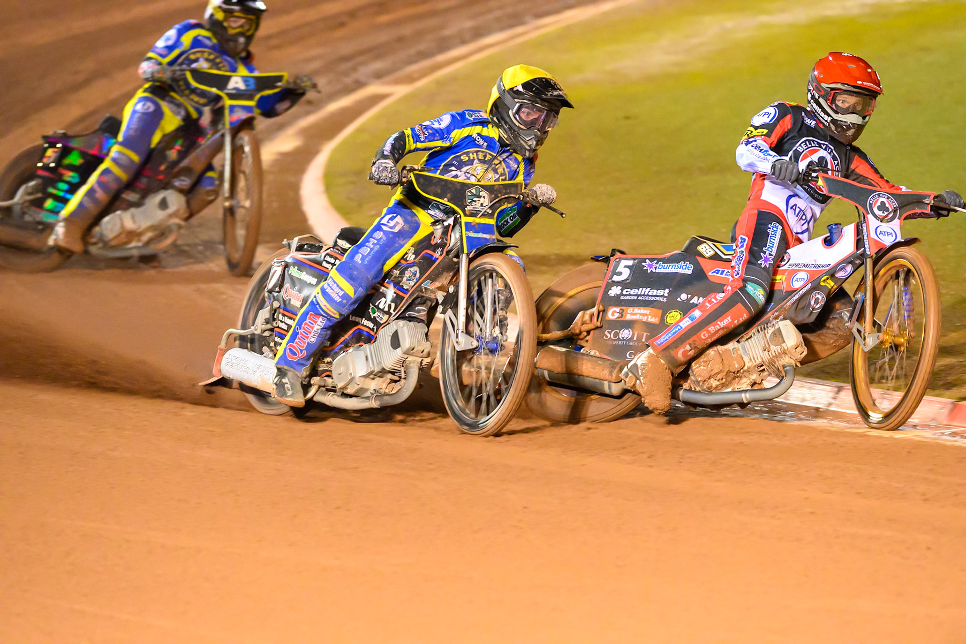 Jason Doyle of Belle Vue Aces in Red on the inside of Luke Killeen of Sheffield Tigers in Yellow  with Josh Pickering of Sheffield Tigers in White behind during the Rowe Motor Oil Premiership Grand Final 2nd Leg between Belle Vue Aces and Sheffield Tigers at the National Speedway Stadium, Manchester on Friday 16th October 2026. (Photo: Ian Charles | MI News)