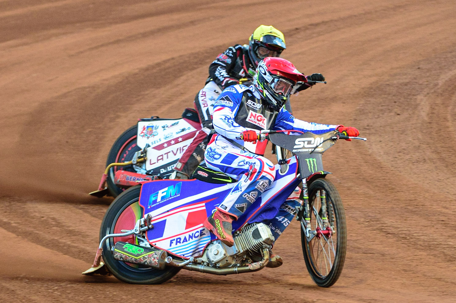MANCHESTER, UK. OCT 16TH David Bellego of France (Red) passes Andzejs Lebedevs of Latvia (White) during the Monster Energy FIM Speedway of Nations at the National Speedway Stadium, Manchester on Saturday  16th October 2021. (Credit: Ian Charles | MI News)