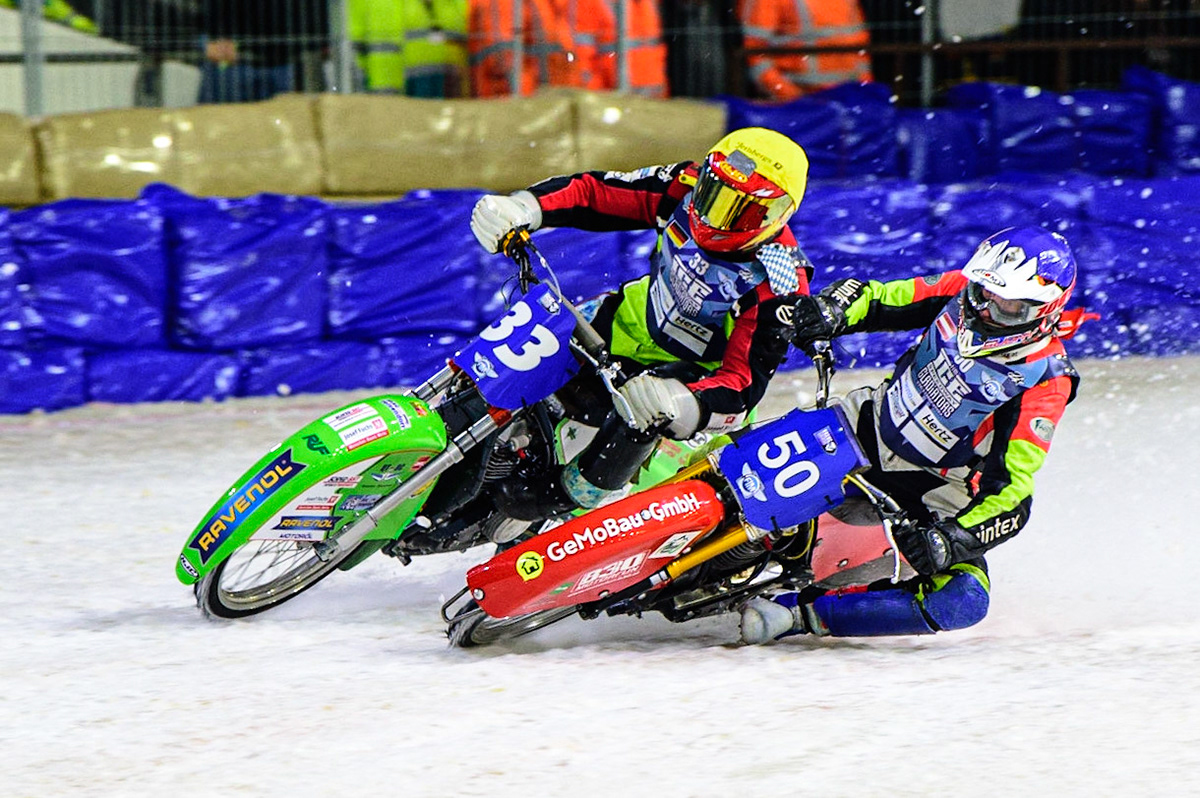 HEERENVEEN, NL.  Harald Simon (50) (Blue) forces his way past Johann Weber (33)  (Yellow) during the FIM Ice Speedway Gladiators World Championship Final 4 at Ice Rink Thialf, Heerenveen on Sunday  3 April 2022. (Credit: Ian Charles | MI News)
