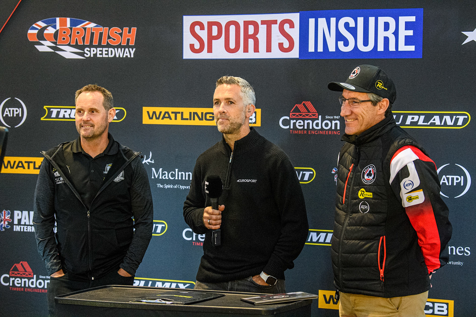 (l - r) Chris Louis , Scott Nicholls and Mark Lemon ready for the managers interviews on Eurosport during the Sports Insure Premiership match between Belle Vue Aces and Ipswich Witches at the National Speedway Stadium, Manchester on Monday 17th July 2023. (Photo: Ian Charles | MI News)
