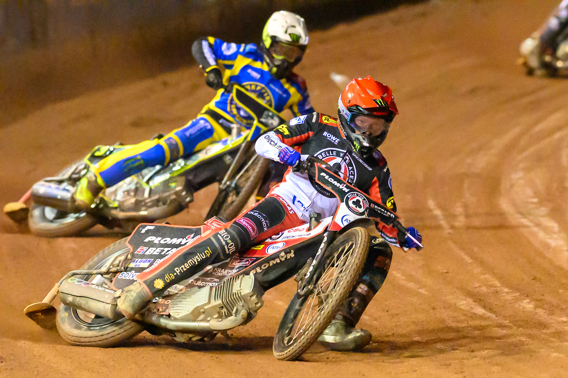 Dan Bewley of Belle Vue Aces  in Red leading Chris Holder of Sheffield Tigers   in White during the Knockout Cup, Northern Section match between Belle Vue Aces and Sheffield Tigers at the National Speedway Stadium, Manchester on Monday 30th March 2026. (Photo: Ian Charles | MI News)