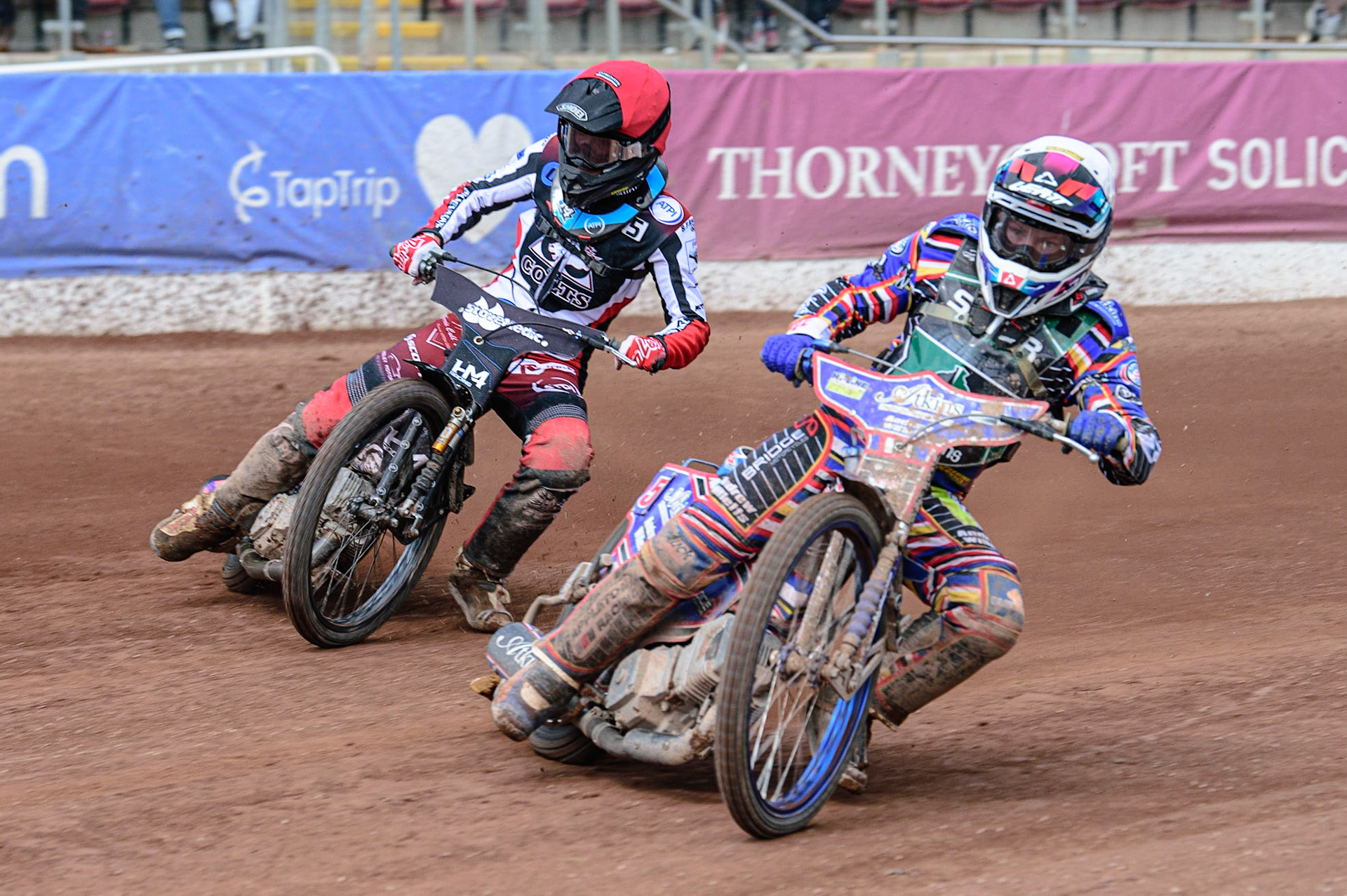 MANCHESTER, UK. APR 15TH  Henry Atkins  (White) leads Harry McGurk  (Red)  during the National Development League match between Belle Vue Colts and Plymouth Centurions at the National Speedway Stadium, Manchester on Friday 15th April 2022. (Credit: Ian Charles | MI News)