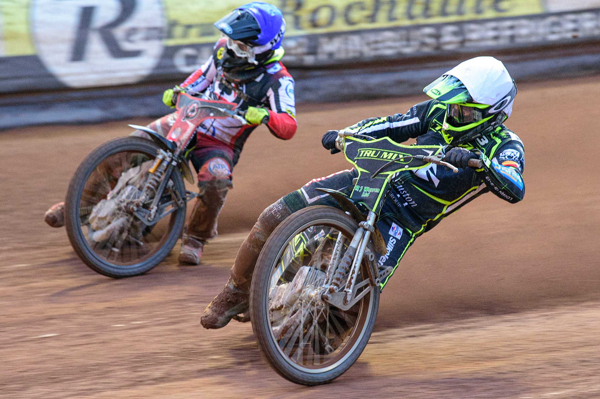 MANCHESTER, UK. JUN 6TH  Danny King  (White) passes Tom Brennan  (Blue) during the SGB Premiership match between Belle Vue Aces and Ipswich Witches at the National Speedway Stadium, Manchester on Monday 6th June 2022. (Credit: Ian Charles | MI News)