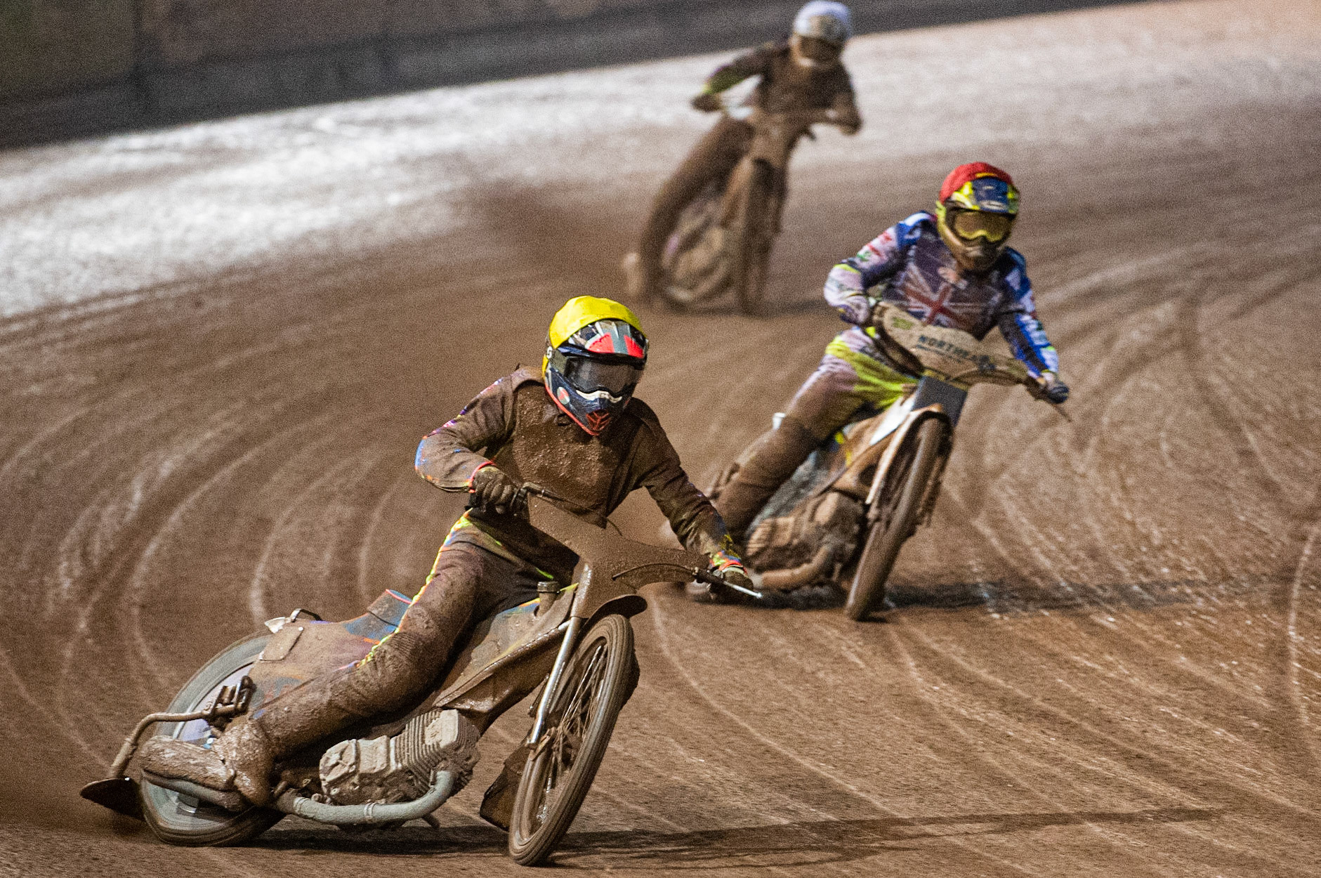 Photo: Ian CharlesRory Schlein  (Yellow)  leads  Chris Harris   (Red) and Tom Brennan  (White) Sports Insure British Speedway Championship Final, National Speedway Stadium, Manchester Monday  28  September  2020