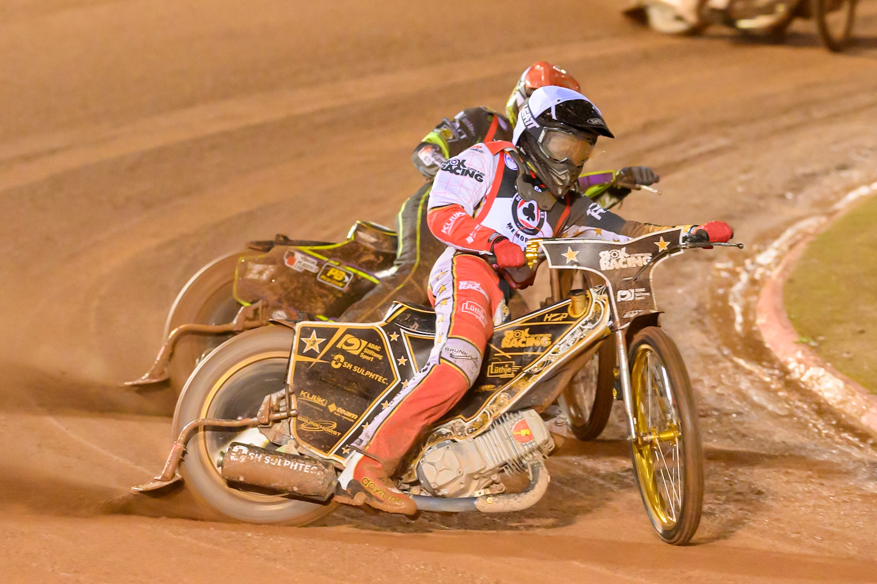 Norick Blodorn  in White leading Tom Brennan  in Red during the Peter Craven Memorial Trophy at the National Speedway Stadium, Manchester, on Monday 16th March 2026. (Photo: Ian Charles | MI News)