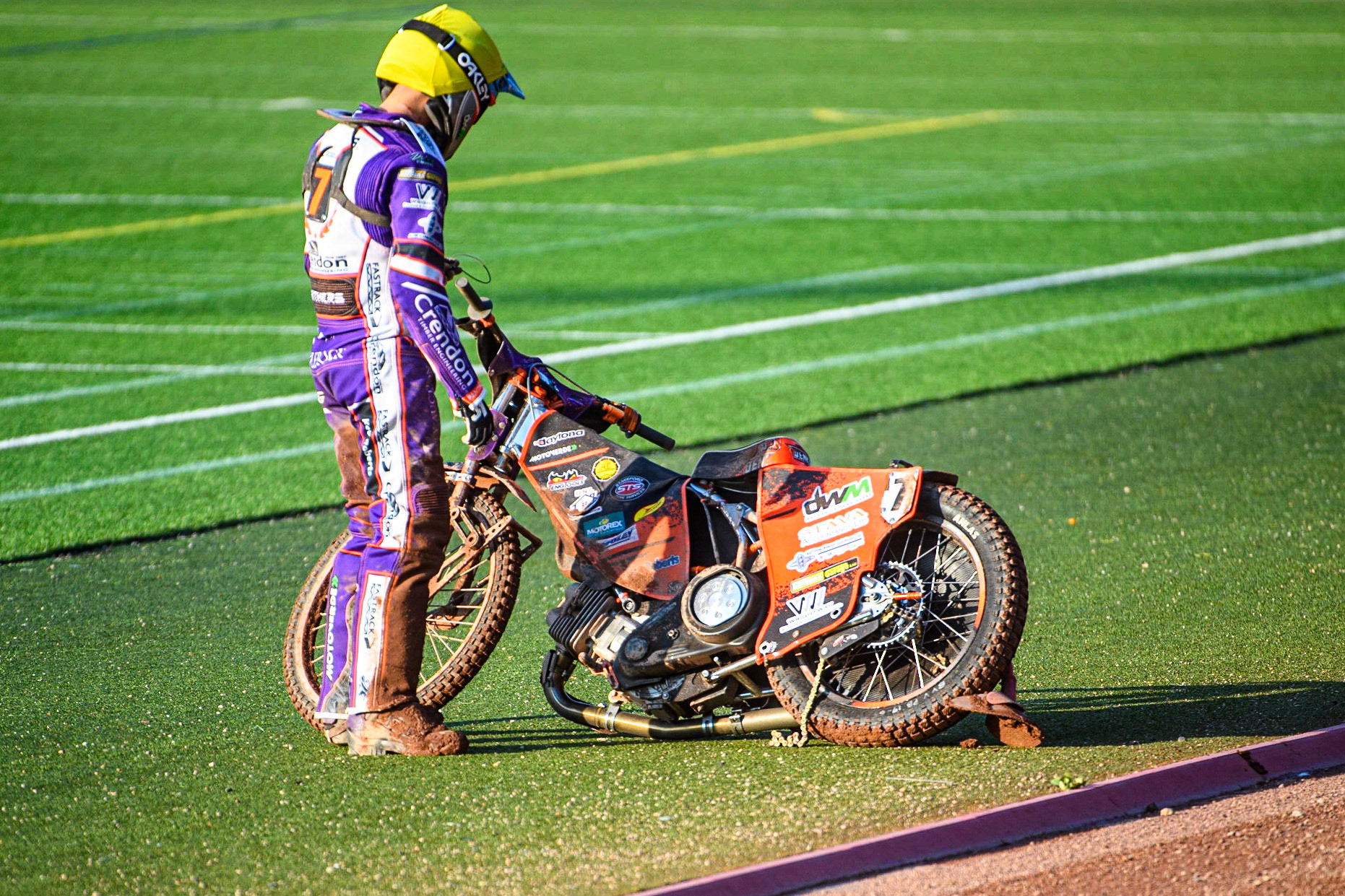 Jordan Jenkins inspects the damage to his bike after his stoppage during the Sports Insure Premiership match between Belle Vue Aces and Peterborough at the National Speedway Stadium, Manchester on Monday 19th June 2023. (Photo: Ian Charles | MI News)