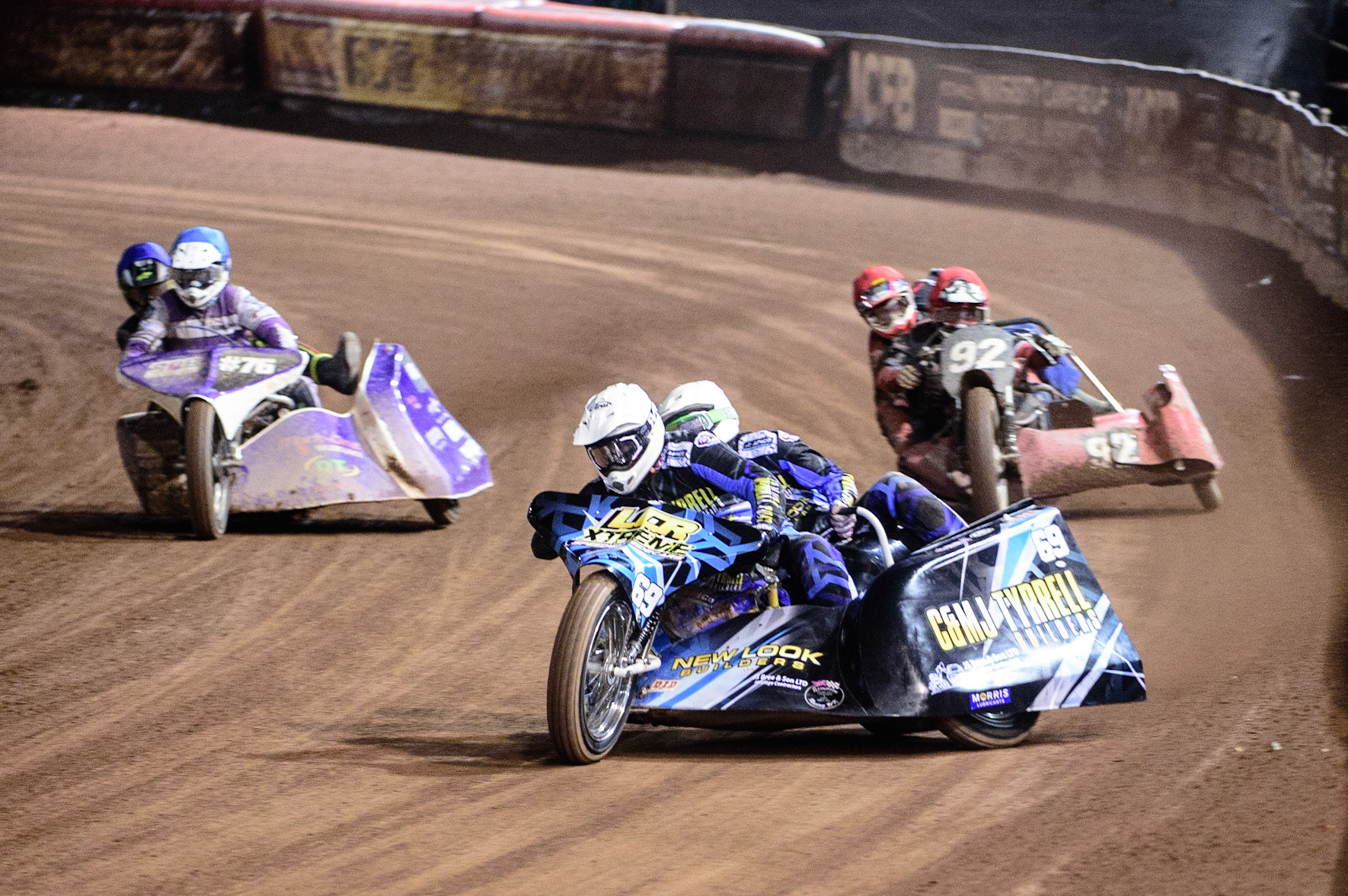 MANCHESTER, UK. OCT 30TH   Matt Tyrell &amp; Liam Brown  (White) lead  Paul Whitelam &amp; Richard Webb  (Red) and Simon Beaney &amp; Sam Heath (Blue) during the Manchester Masters Sidecar Speedway and Flat Track Racing at the National Speedway Stadium, Manchester on Saturday 30th October 2021. (Credit: Ian Charles | MI News)