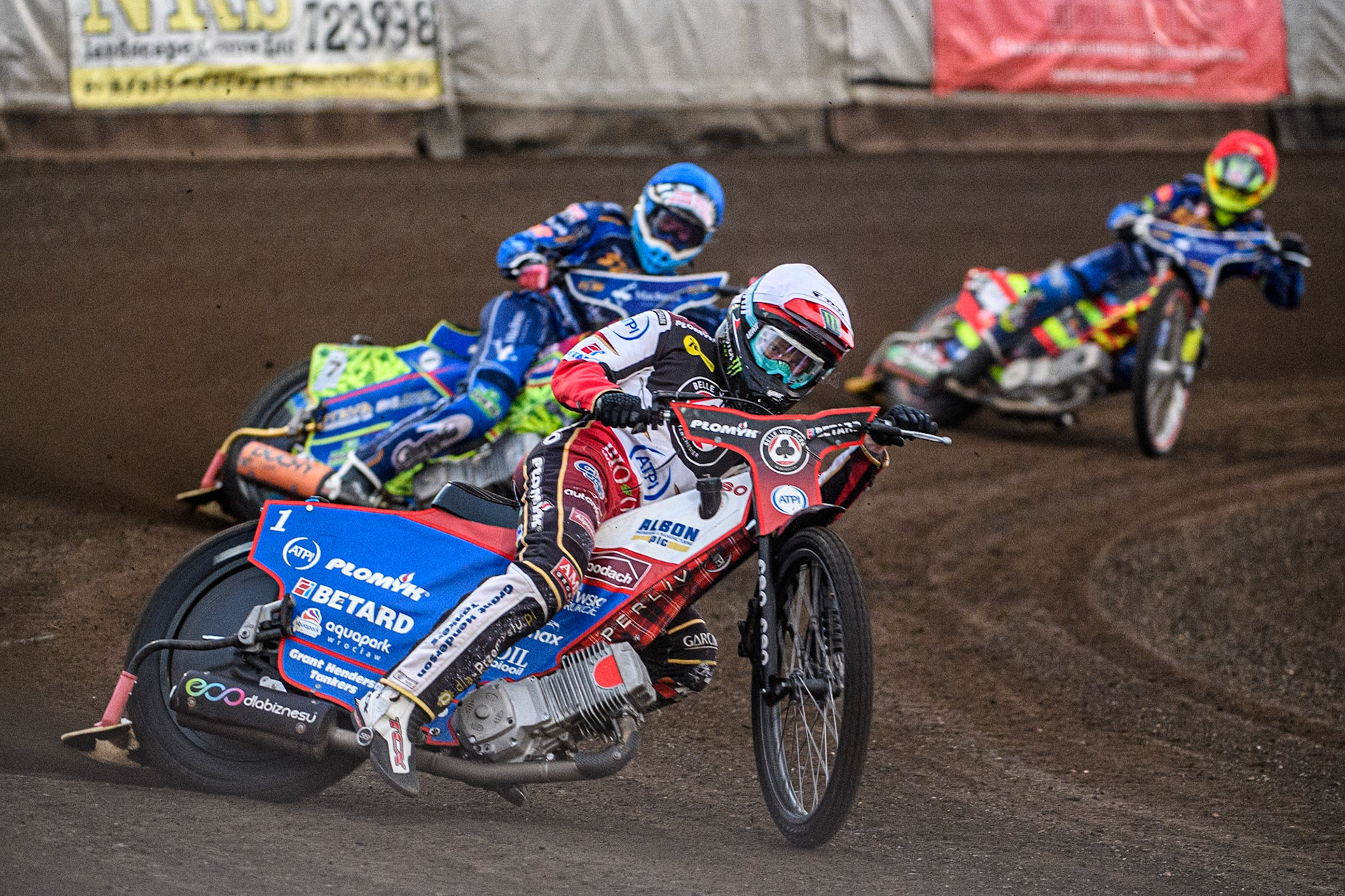 Dan Bewley  (White) leads Anders Rowe (Blue) and Michael Palm Toft  (Red) during the Sports Insure Premiership match between King's Lynn Stars and Belle Vue Aces at the Adrian Flux Arena, King's Lynn on Thursday 24th August 2023. (Photo: Ian Charles | MI News)