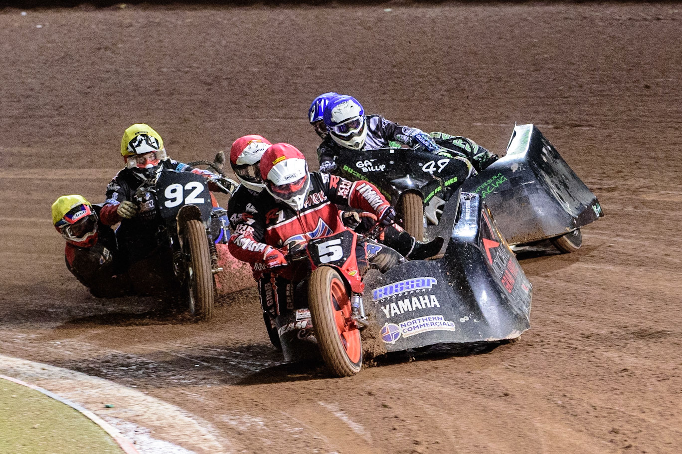 MANCHESTER, UK. OCT 30TH   Mick Cave &amp; Bradley Steer  (Red) leads Gareth Winterburn &amp; Bradley Atkinson (Blue) and Paul Whitelam &amp; Richard Webb  (Yellow) during the Manchester Masters Sidecar Speedway and Flat Track Racing at the National Speedway Stadium, Manchester on Saturday 30th October 2021. (Credit: Ian Charles | MI News)
