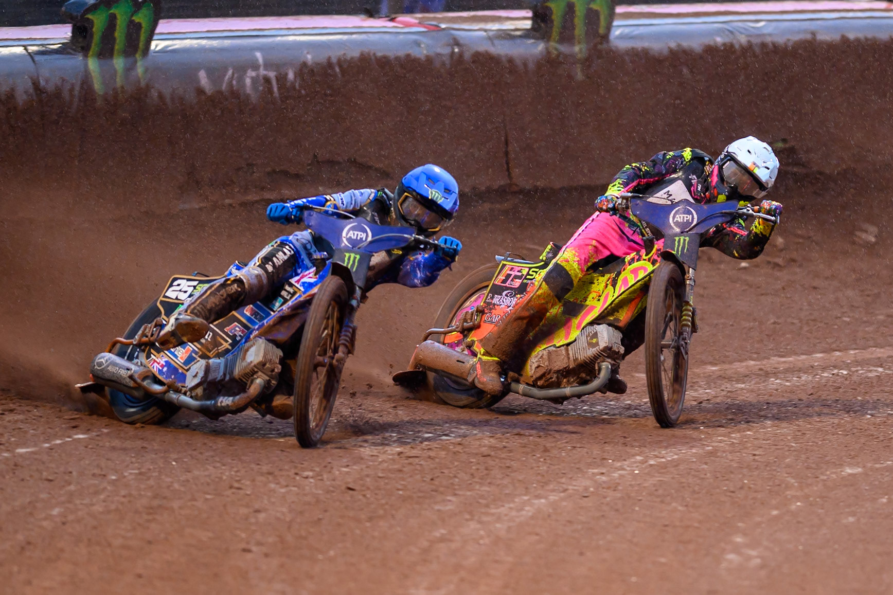 Jack Holder (25) of Australia in Blue leading Michael Jepsen Jensen (52) of Denmark in White in the First Last Chance Heat during the ATPI  FIM Speedway GP of Manchester at the National Speedway Stadium, Manchester on Friday 5th June 2026. (Photo: Ian Charles | MI News)