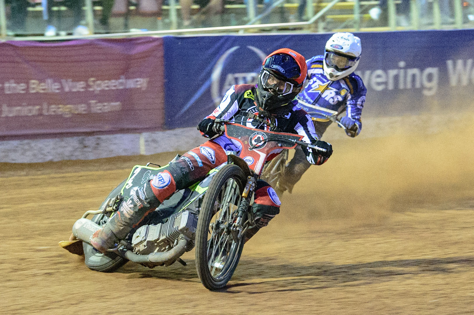 MANCHESTER UK  Tom Brennan  (Red) leads Josh Pickering  (White) during the SGB Premiership match between Belle Vue Aces and King's Lynn Stars at the National Speedway Stadium, Manchester on Monday 11th July 2022. (Credit: Ian Charles | MI News)