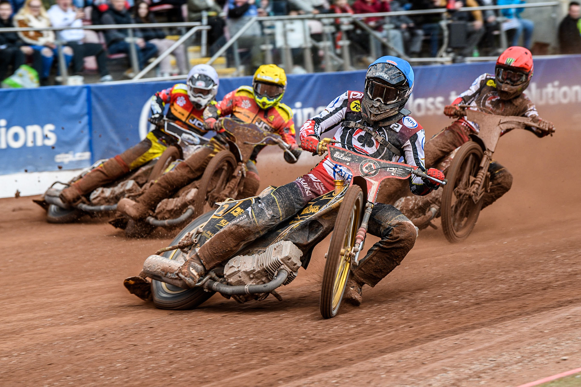 Norick Blodorn  (Blue) leads Chris Harris  (Yellow) Richard Lawson  (White) and Dan Bewley  (Red) during the SGB Premiership match between Belle Vue Aces and Leicester Lions at the National Speedway Stadium, Manchester on Monday 1st May 2023. (Photo: Ian Charles | MI News)