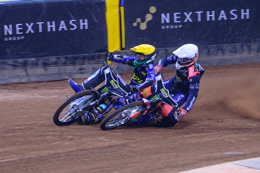 Andžejs Ļebedevs (29) (White) collides with Jason Doyle (69) (Yellow) on the opening turn during the FIM  Speedway Grand Prix of Great Britain at the Principality Stadium, Cardiff on Saturday 13th August 2022. (Credit: Ian Charles | MI News