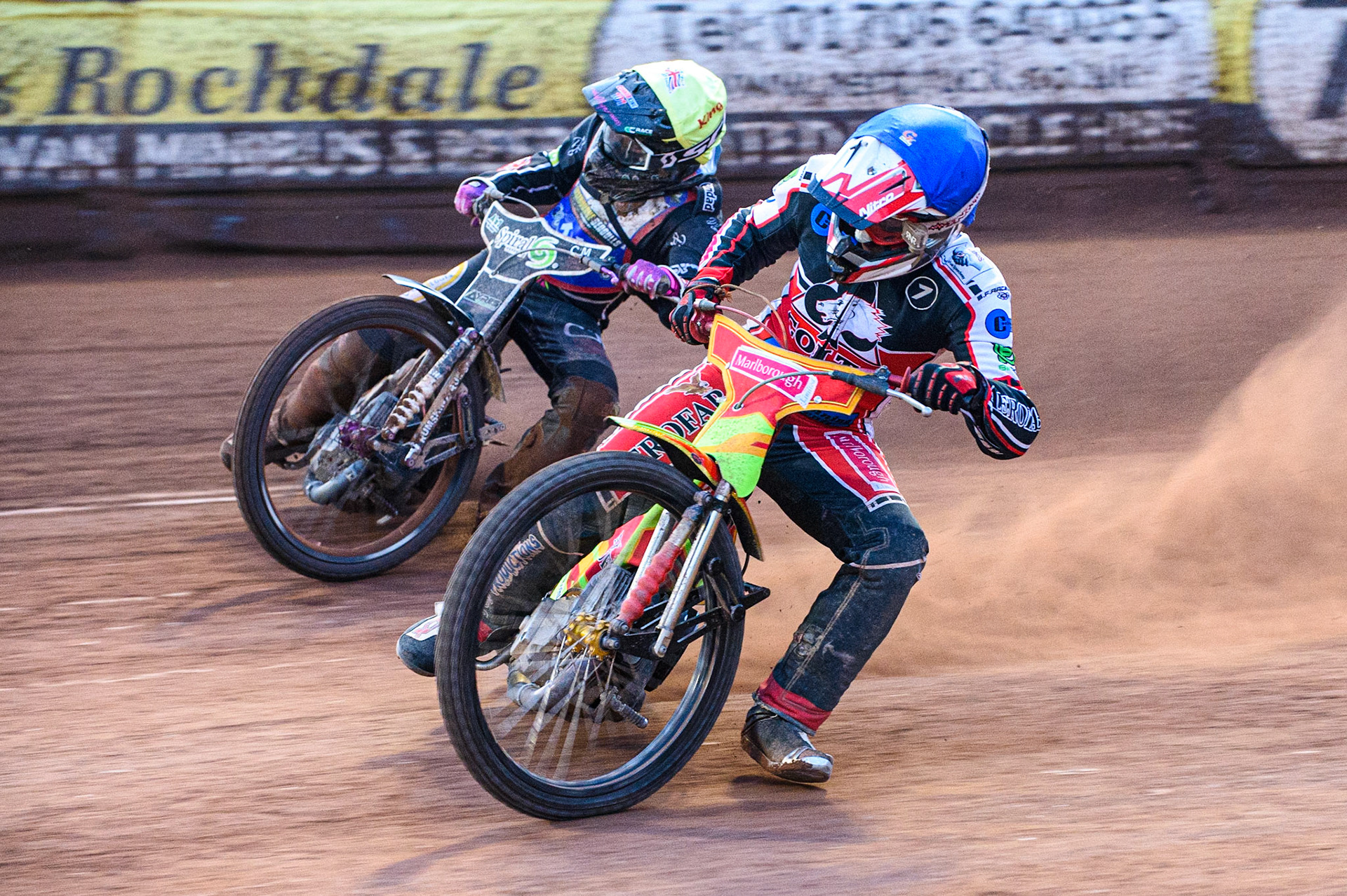 MANCHESTER, UK. JULY 23RD Ben Woodhull  (Blue) inside Connor King  (Yellow) during the National Development League match between Belle Vue Colts and Eastbourne Seagulls at the National Speedway Stadium, Manchester on Friday 23rd July 2021. (Credit: Ian Charles | MI News)