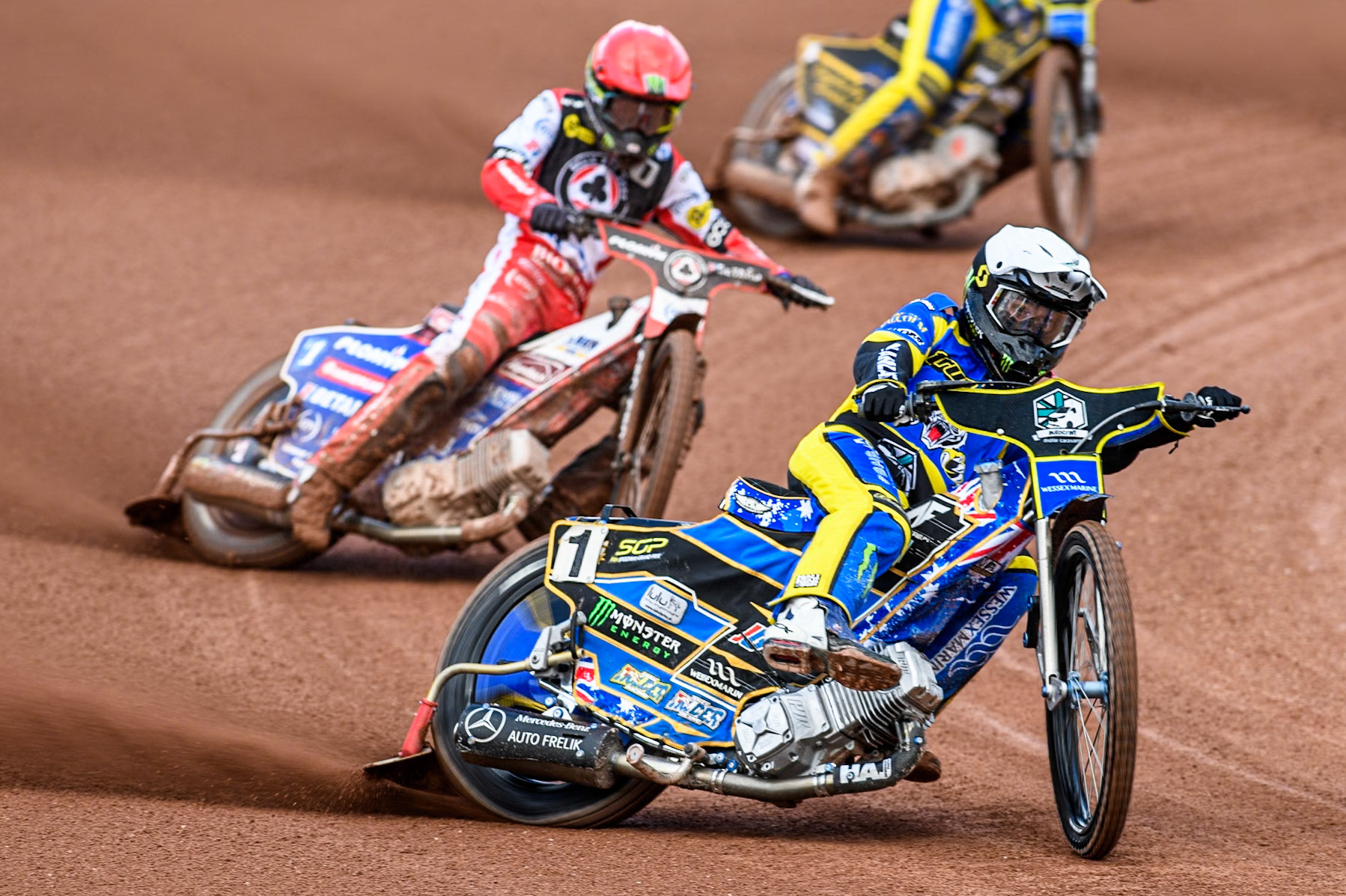 Sheffield Tigers' Jack Holder  in White leading Belle Vue Aces' Dan Bewley   in Red during the Rowe Motor Oil Premiership match between Belle Vue Aces and Sheffield Tigers at the National Speedway Stadium, Manchester on Monday 26th August 2024. (Photo: Ian Charles | MI News)