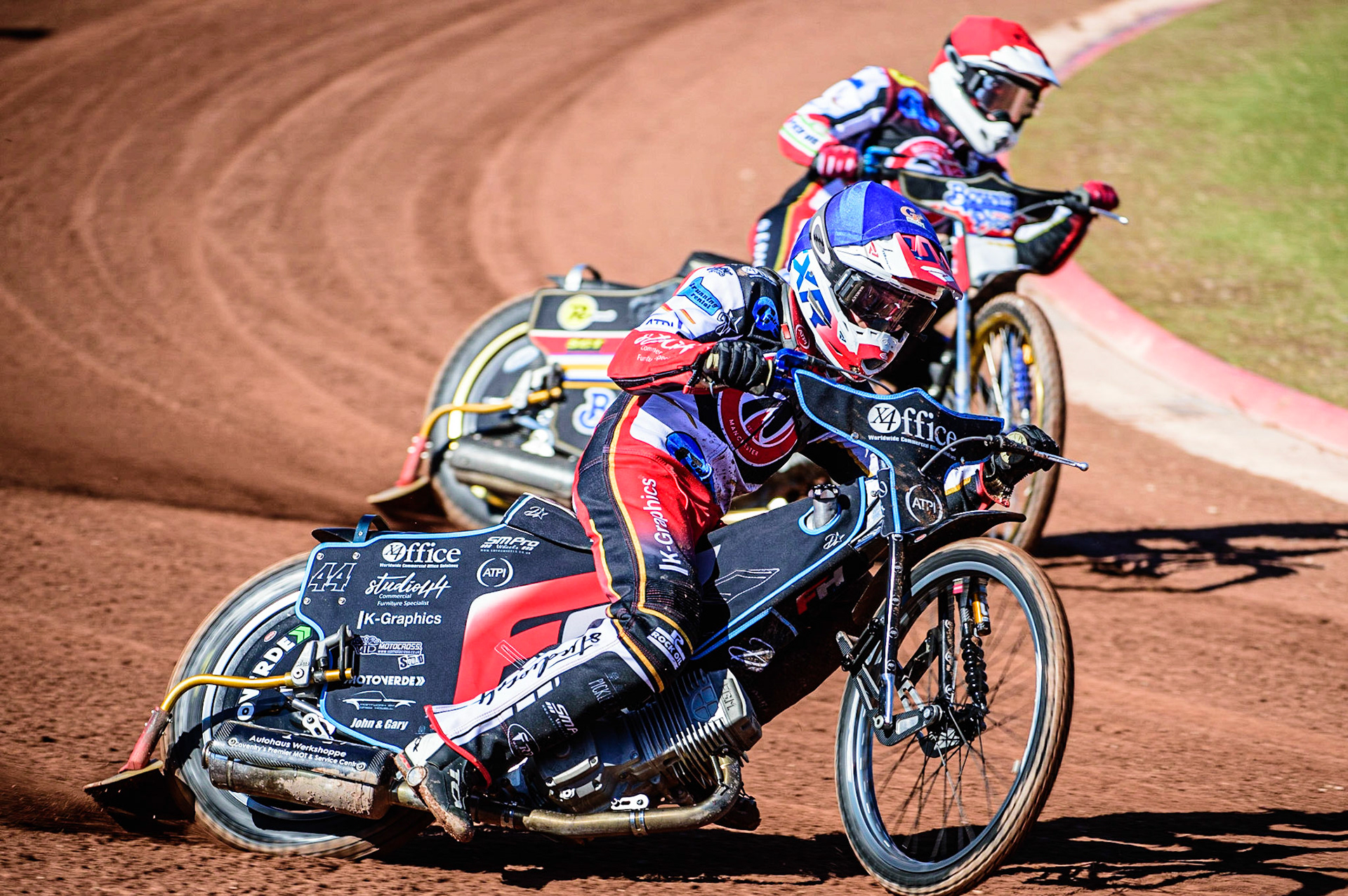 Freddy Hodder   (Blue) leads team mate Paul Bowen   (Red) as the Colts go for maximum points during the National Development League match between Belle Vue Colts and Berwick Bullets at the National Speedway Stadium, Manchester on Friday 7th April 2023. (Photo: Ian Charles | MI News)