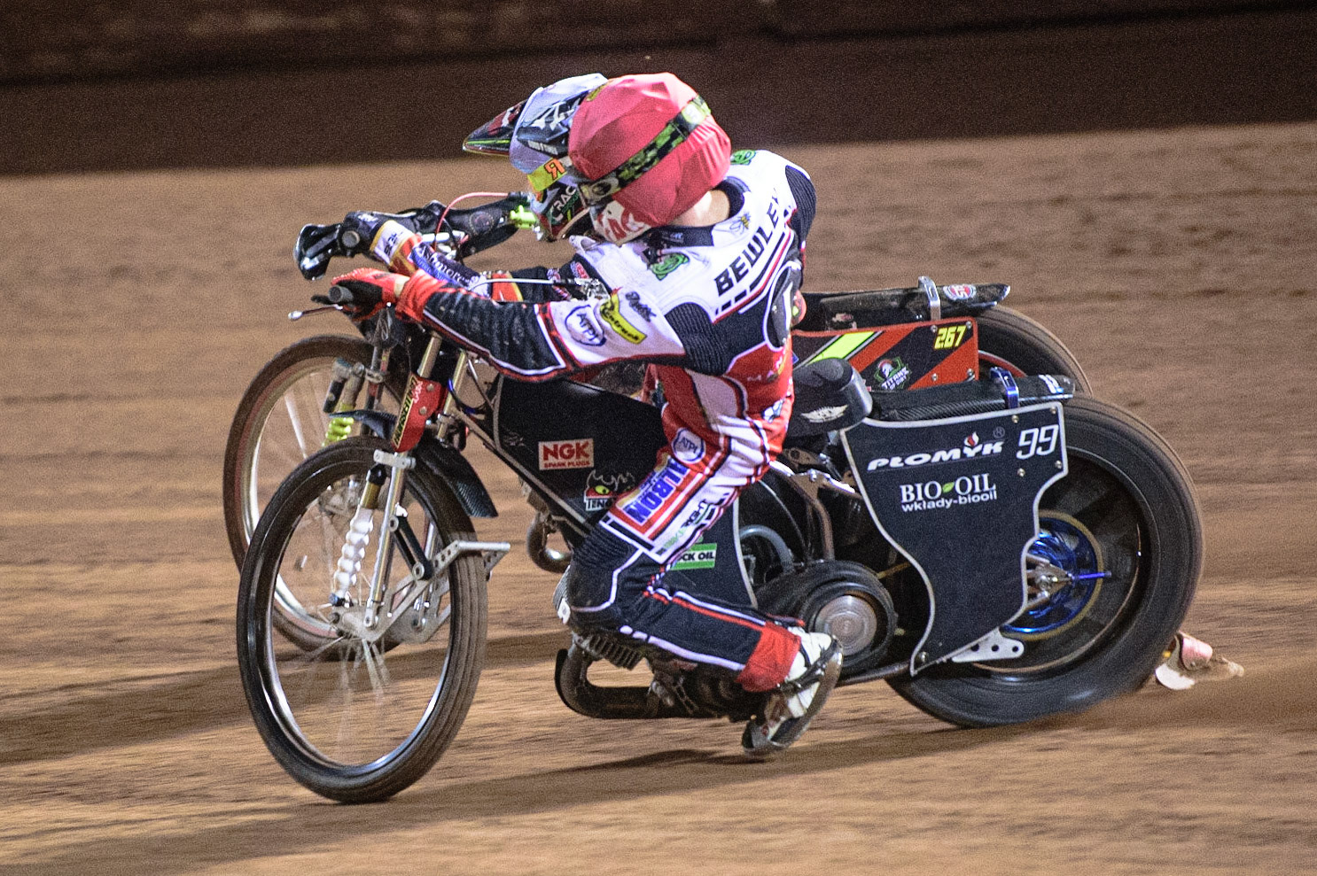 MANCHESTER, UK. OCT 11TH  Dan Bewley  (Red) inside Michael Palm Toft  (White) during the SGB Premiership Grand Final 1st Leg between Belle Vue Aces and Peterborough Panthers at the National Speedway Stadium, Manchester on Monday 11th October 2021. (Credit: Ian Charles | MI News)