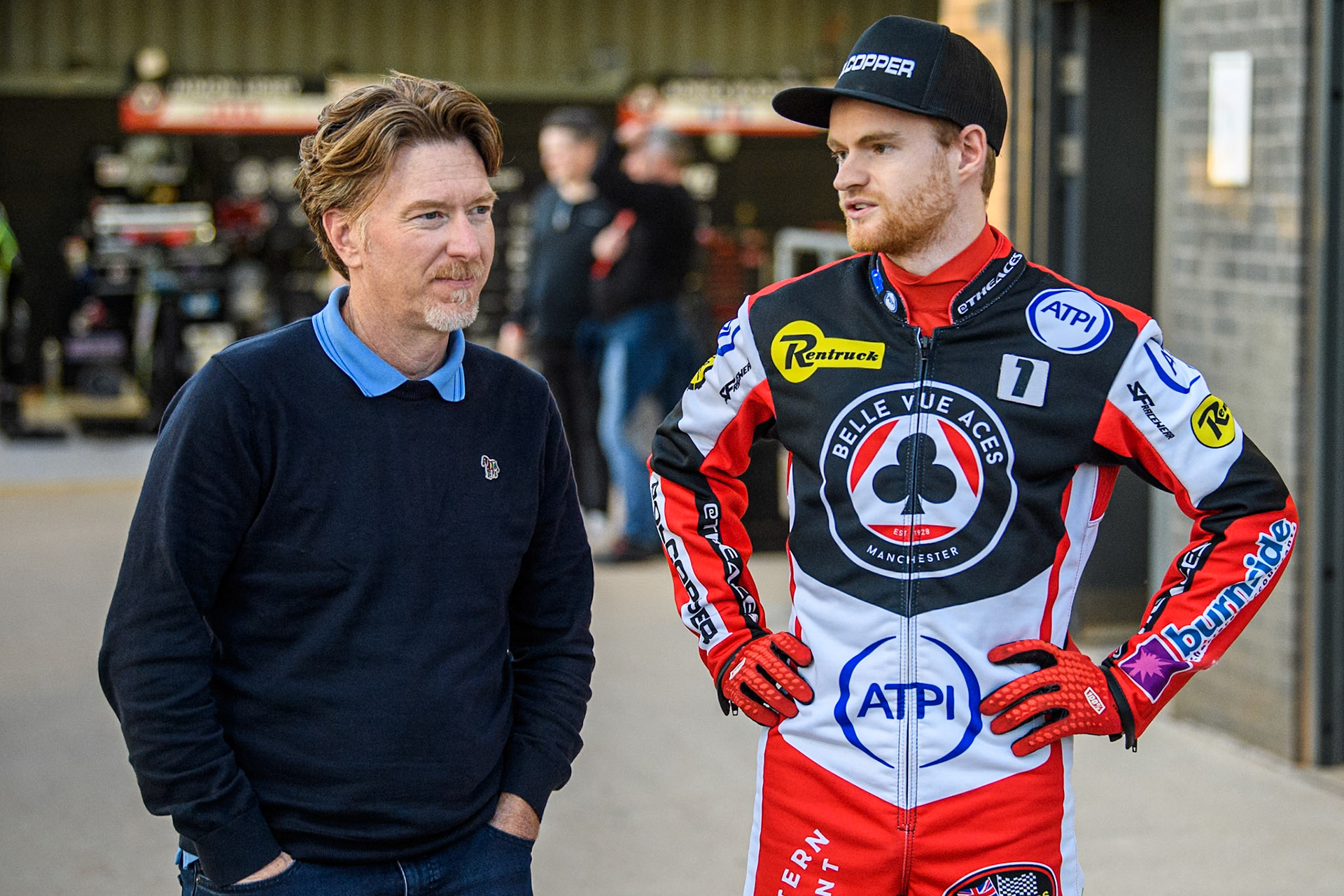 Belle Vue Aces' Brady Kurtz  (Right) chats with former World Champion Jason Crump (Left) during the Rowe Motor Oil Premiership Play Off Semi Final 2, 1st Leg match between Belle Vue Aces and Sheffield Tigers at the National Speedway Stadium, Manchester on Monday 16th September 2024. (Photo: Ian Charles | MI News)