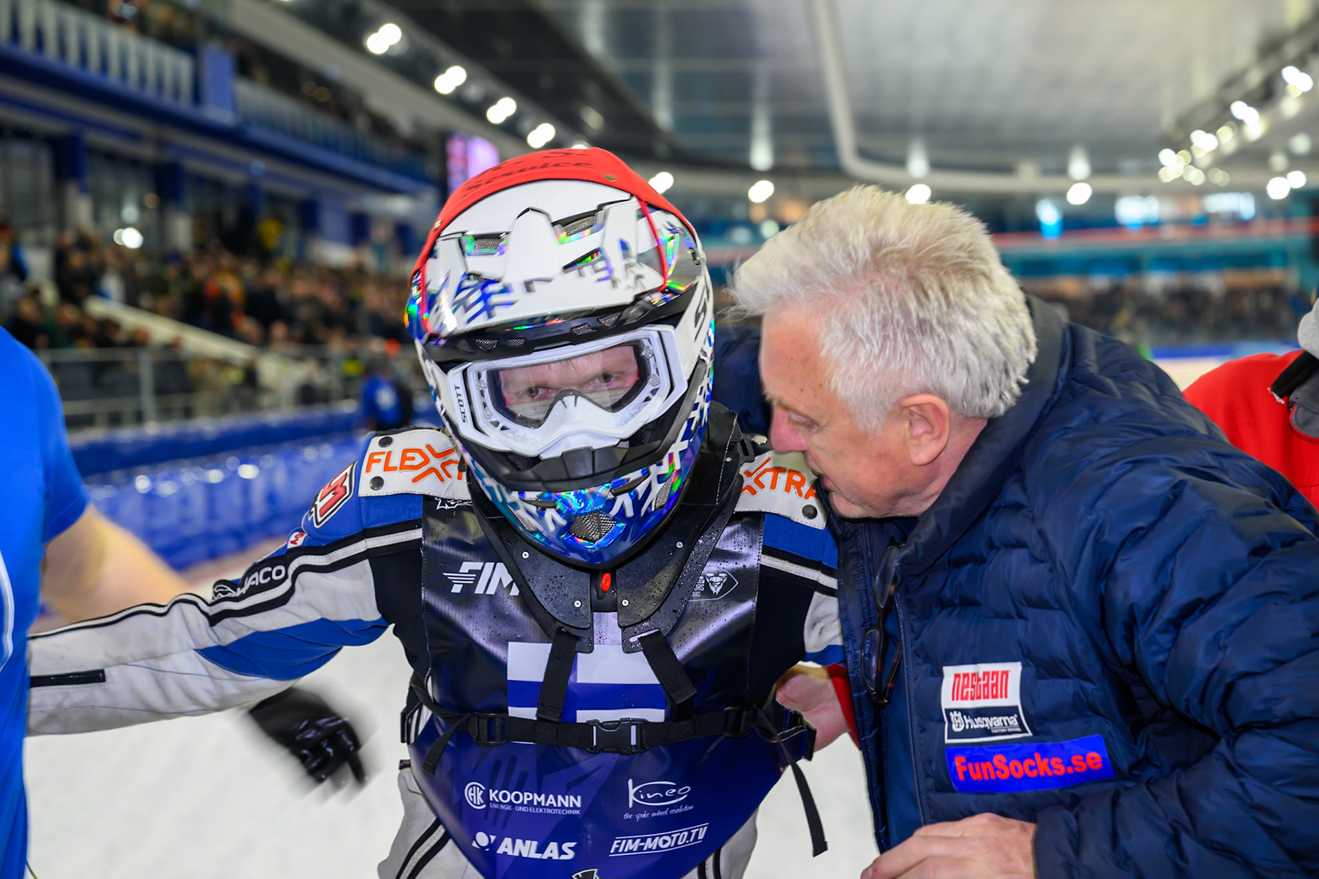 Max Koivula (11) of Finland is congratulated by their team sponsor during the FIM Ice Speedway Of Nations at Ice Rink Thialf, Heerenveen on Sunday 12th April 2026. (Photo: Ian Charles | MI News)