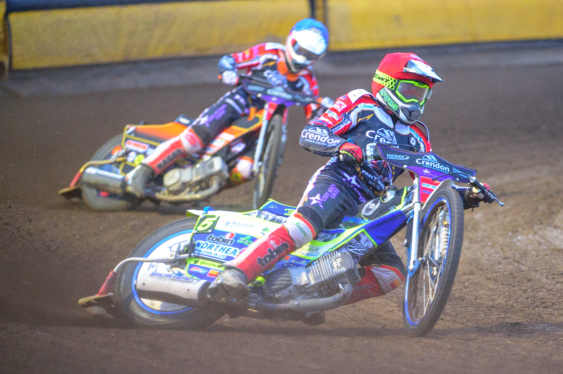 PETERBOROUGH, UK. MAY 9TH  Chris Harris  (Red) leads team mate Jordan Palin  (Blue) during the SGB Premiership match between Peterborough Panthers and Belle Vue Aces at East of England Showground, Peterborough on Monday 9th May 2022. (Credit: Ian Charles | MI News)