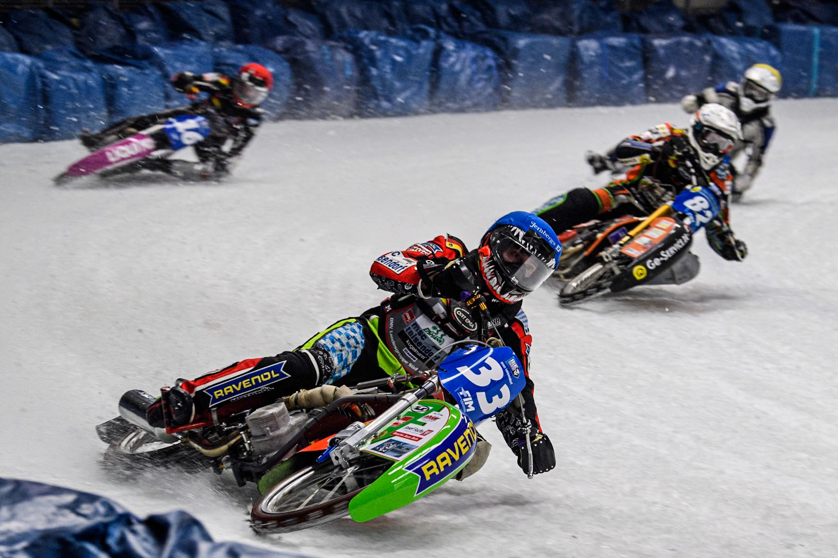 Germany's Johann Weber (33) (Blue) leads  Germany's Markus Jell (82) (White) Finland's Max Koivula (24)  (Yellow) and Germany's Benedikt Monn (16) (Red) during the FIM Ice Speedway Gladiators World Championship Final 1 at the Max-Aicher-Arena, Inzell on Saturday 23 March 2024. (Photo: Ian Charles | MI News)