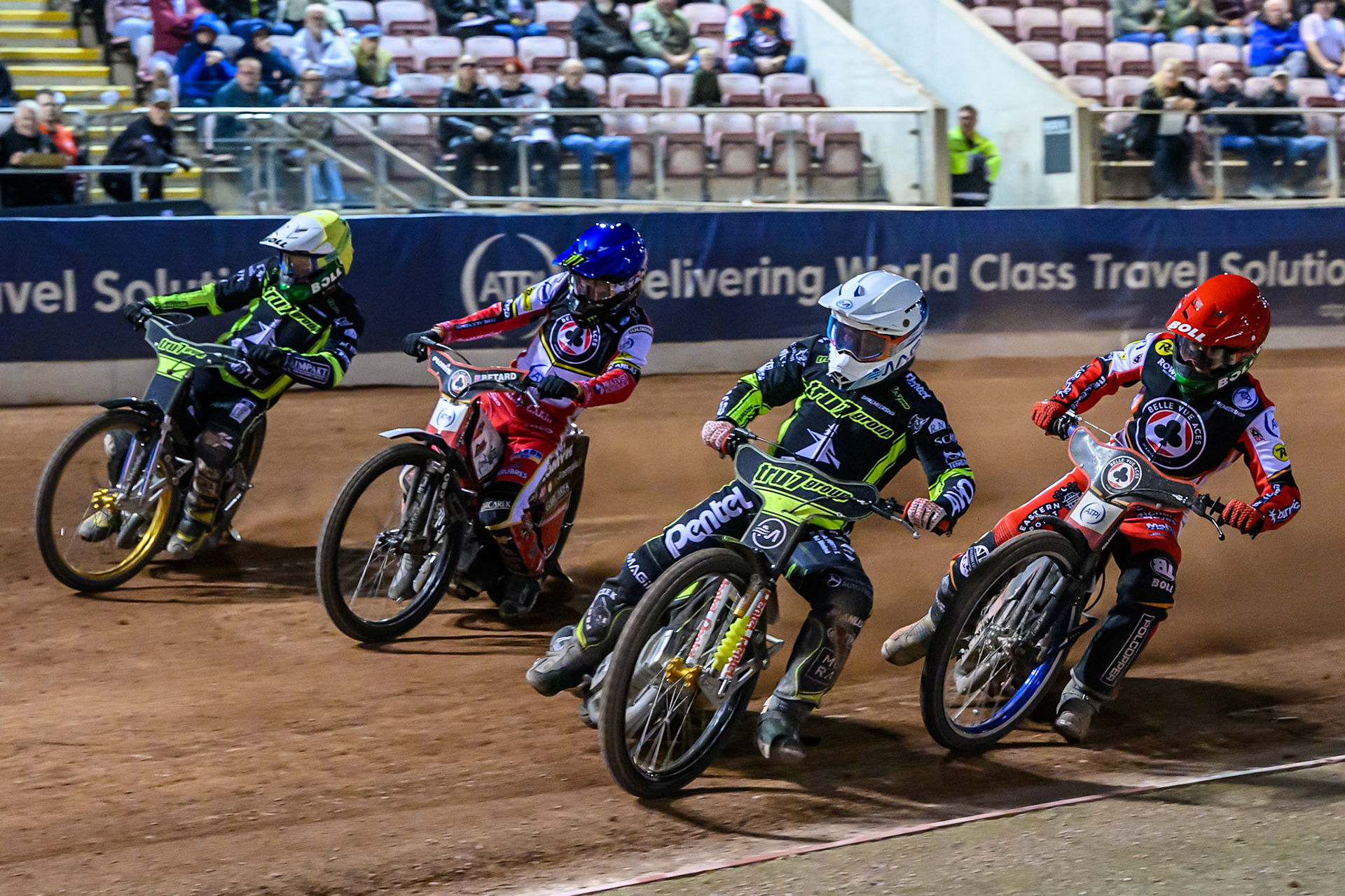 Emil Sayfutdinov of Ipswich Witches  in White leading Brady Kurtz of Belle Vue Aces  in Red Dan Bewley of Belle Vue Aces  in Blue and Jason Doyle of Ipswich Witches  in Yellow into the first turn in Heat 15 during the Rowe Motor Oil Premiership match between Belle Vue Aces and Ipswich Witches at the National Speedway Stadium, Manchester on Monday 4th August 2025. (Photo: Ian Charles | MI News)