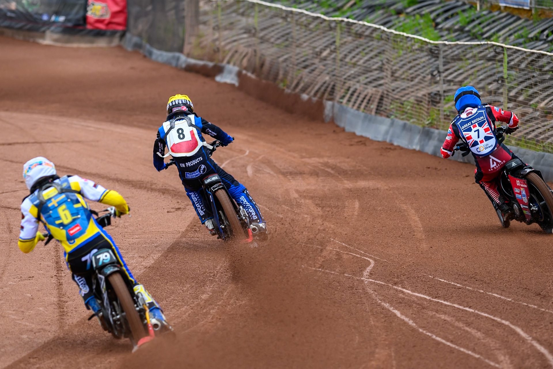 Antoni Mencel of Poland in Yellow leading Ashton Boughen of Great Britain in Blue and Noel Wahlquist of Sweden in White during the FIM SGP2 Qualifying Round at the Peugeot Ashfield Stadium in Glasgow on Saturday 24th May 2025. (Photo: Ian Charles | MI News)