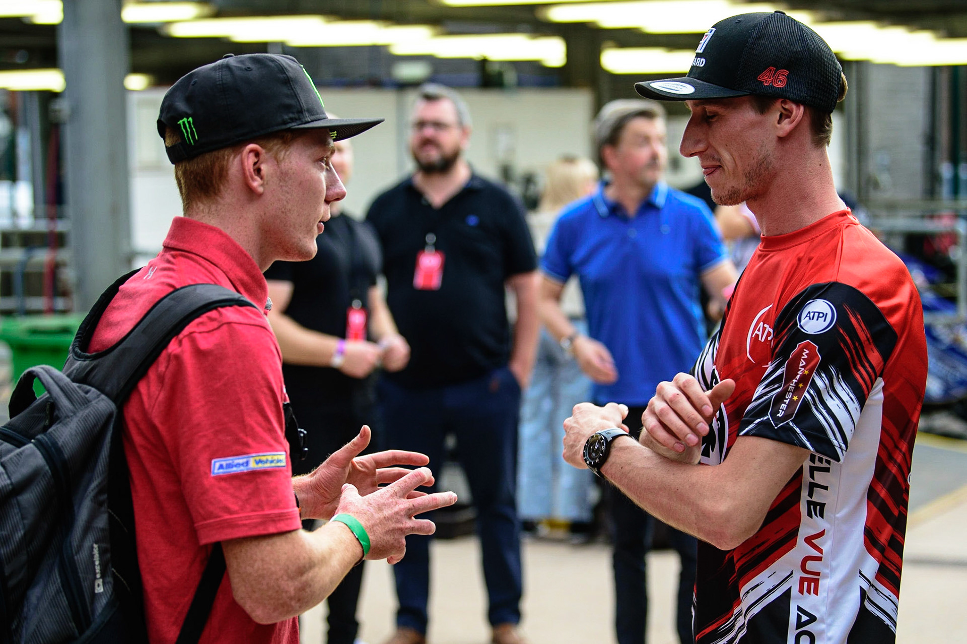 MANCHESTER UK  Former Aces rider Dan Bewley (left) chats with Max Fricke  during the SGB Premiership match between Belle Vue Aces and King's Lynn Stars at the National Speedway Stadium, Manchester on Monday 11th July 2022. (Credit: Ian Charles | MI News)
