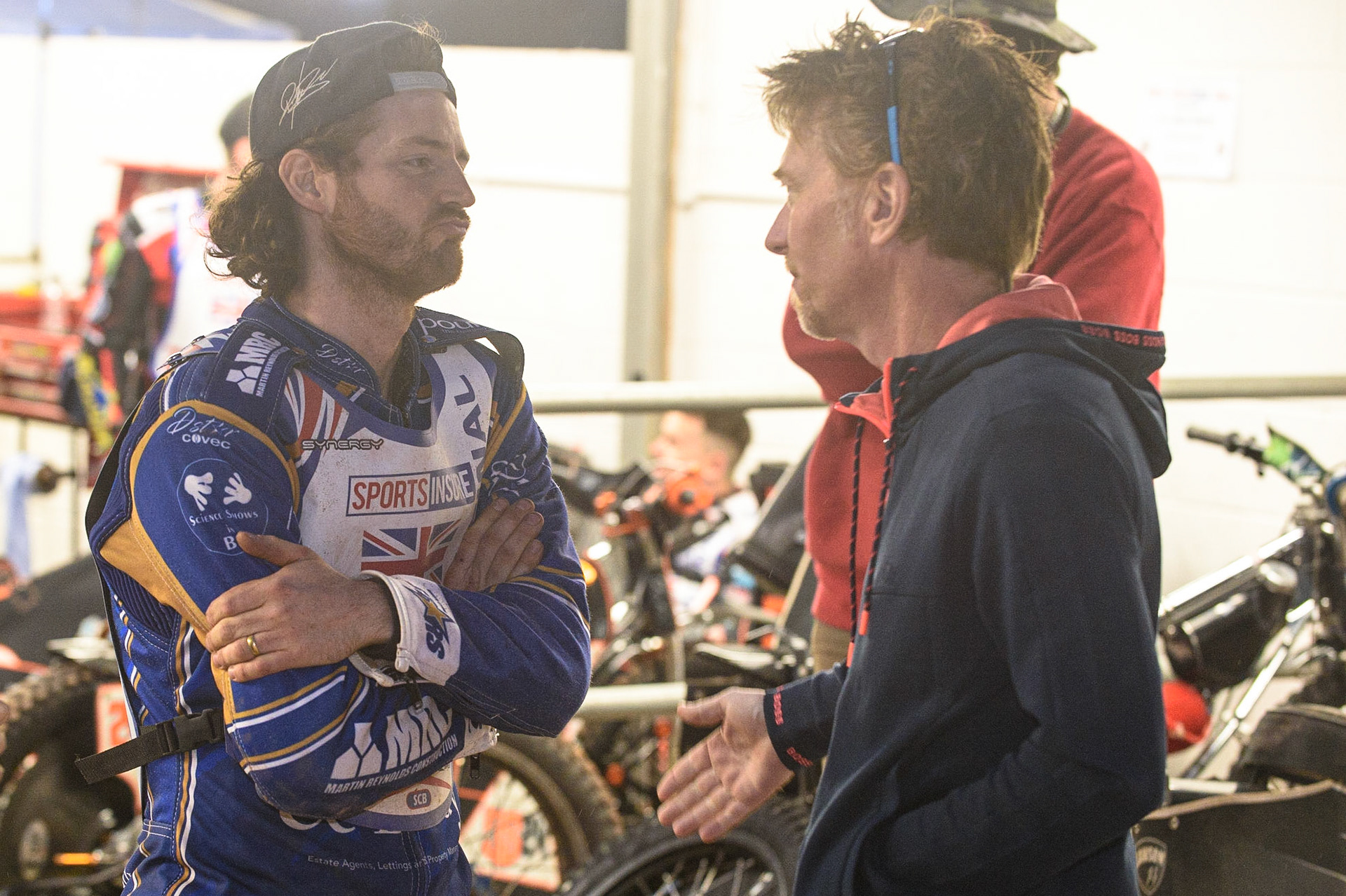 MANCHESTER, UK. AUGUST 16TH   Richard Lawson (left) chats with Jason Crump  during the Sports Insure British Speedway Finals at the National Speedway Stadium, Manchester on Monday 16th August 2021. (Credit: Ian Charles | MI News)