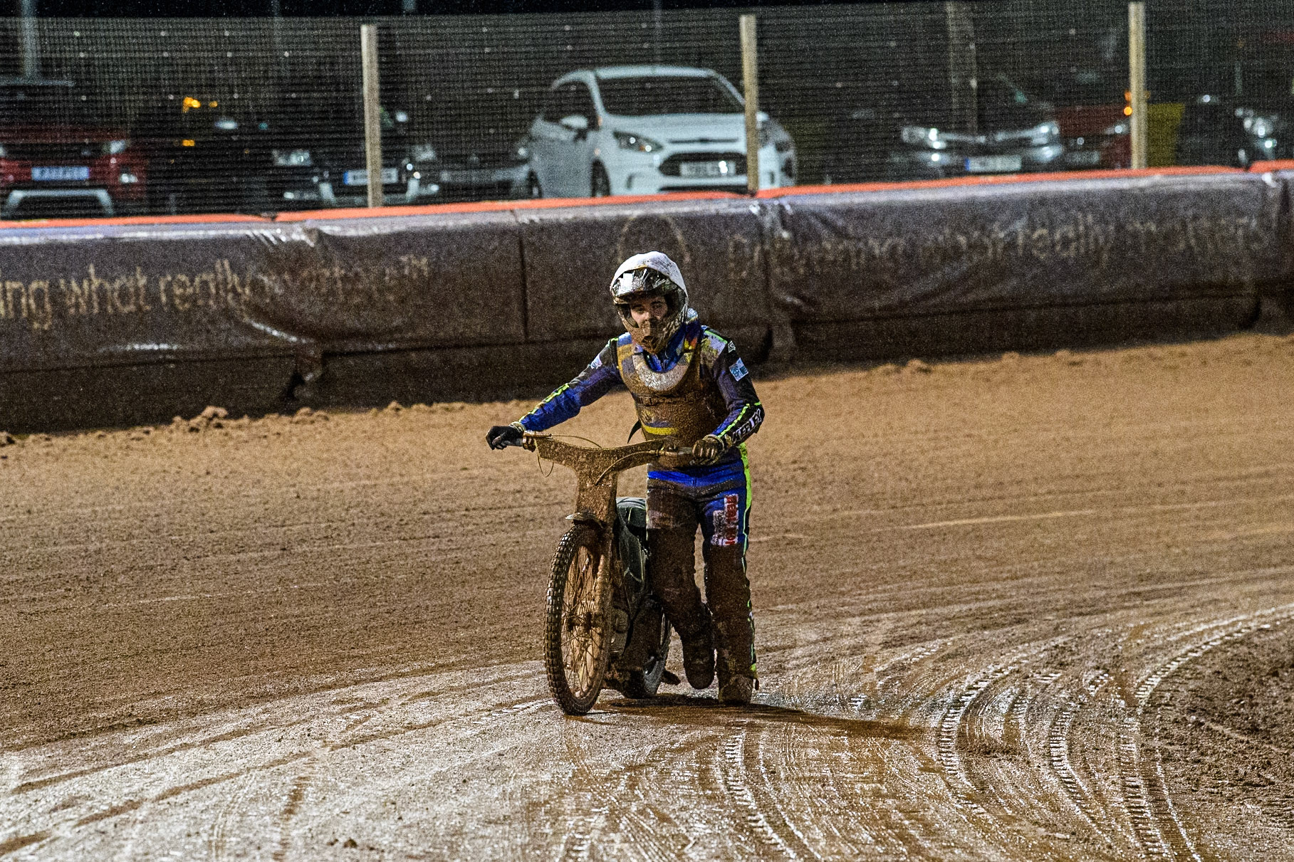 Sheffield Cubs' Nathan Ablitt pushes his bike home for the third place point after his mechanical problem during the WSRA National Development League match between Belle Vue Colts and Sheffield Tiger Cubs at the National Speedway Stadium, Manchester on Monday 7th October 2024. (Photo: Ian Charles | MI News)