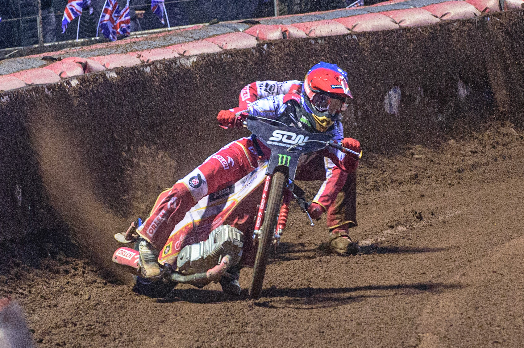 MANCHESTER, UK. OCT 17TH The moment Great Britain became champions as pl1(Red) causes team mate Maciej Janowski (Blue) to hit the dirt during the Monster Energy FIM Speedway of Nations at the National Speedway Stadium, Manchester on Sunday  17th October 2021. (Credit: Ian Charles | MI News)