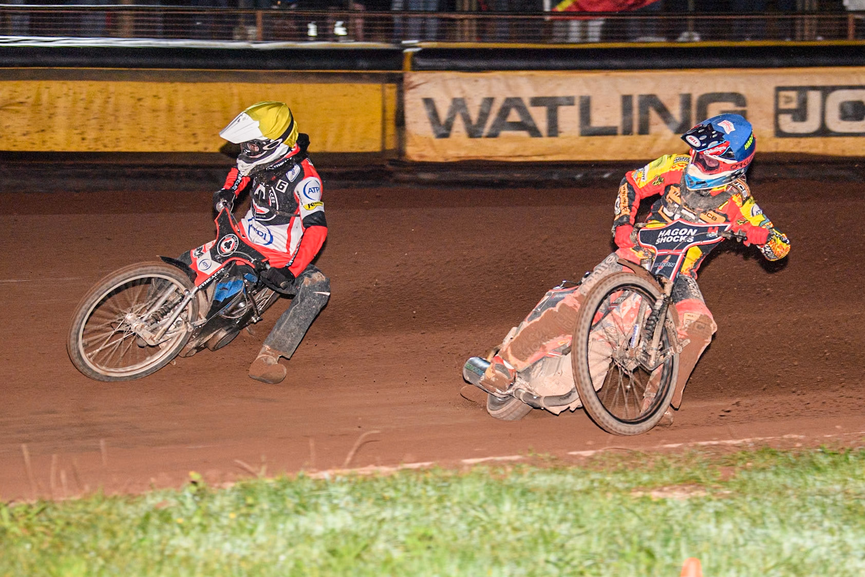 Leicester Lions' Sam Hagon in Bluec\ Belle Vue Aces' Antti Vuolas in Yellow during the Rowe Motor Oil Premiership Grand Final 2nd Leg between Leicester Lions and Belle Vue Aces at the Pidcock Motorcycles Arena, Leicester on Thursday 26th September 2024. (Photo: Ian Charles | MI News)