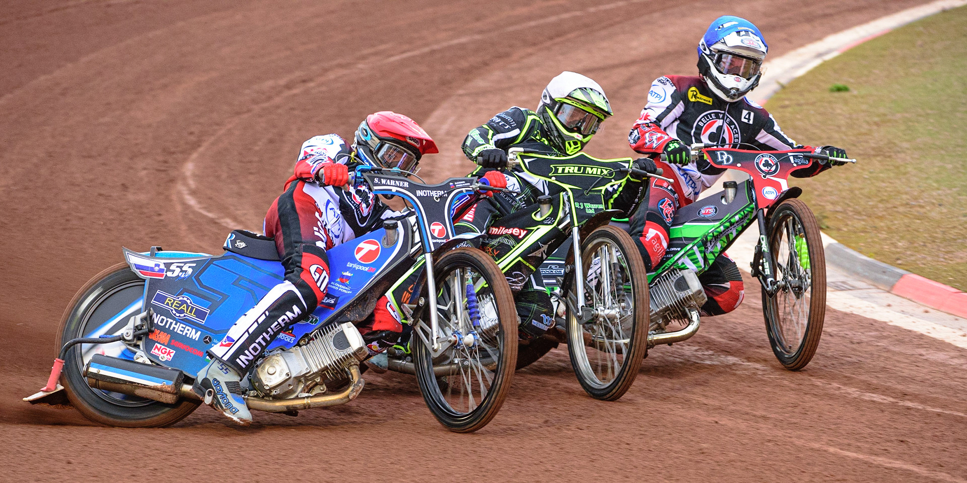 MANCHESTER, UK. JUN 6TH  Matej Žagar  (Red) outside Danny King  (White) and Charles Wright  (Blue) during the SGB Premiership match between Belle Vue Aces and Ipswich Witches at the National Speedway Stadium, Manchester on Monday 6th June 2022. (Credit: Ian Charles | MI News)