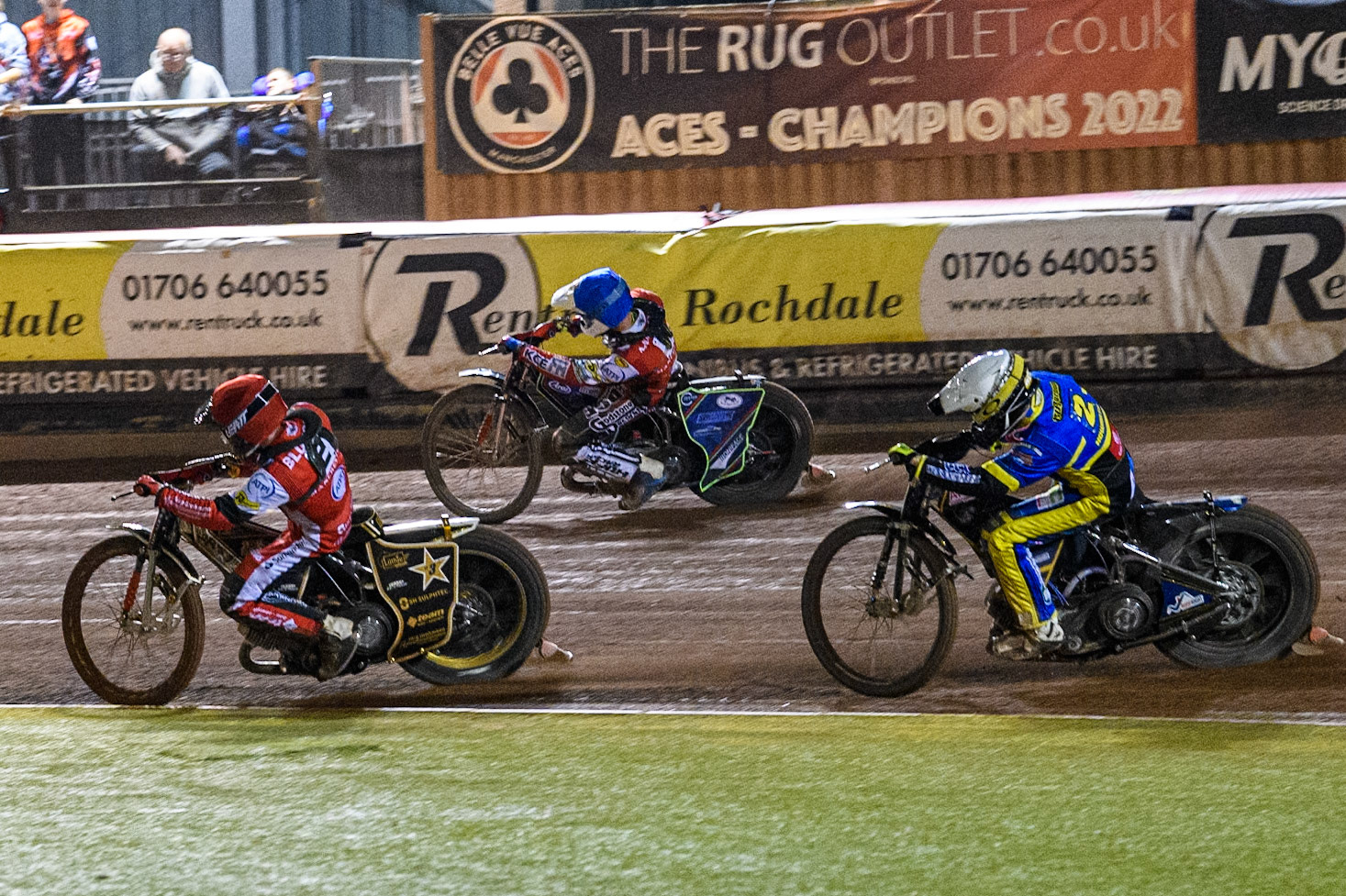 Belle Vue Aces' Norick Blodorn  in Red rides inside Belle Vue Aces' Jake Mulford  in Blue with Sheffield Tigers' Kyle Howarth  in White chasing during the Rowe Motor Oil Premiership Play Off Semi Final 2, 1st Leg match between Belle Vue Aces and Sheffield Tigers at the National Speedway Stadium, Manchester on Monday 16th September 2024. (Photo: Ian Charles | MI News)