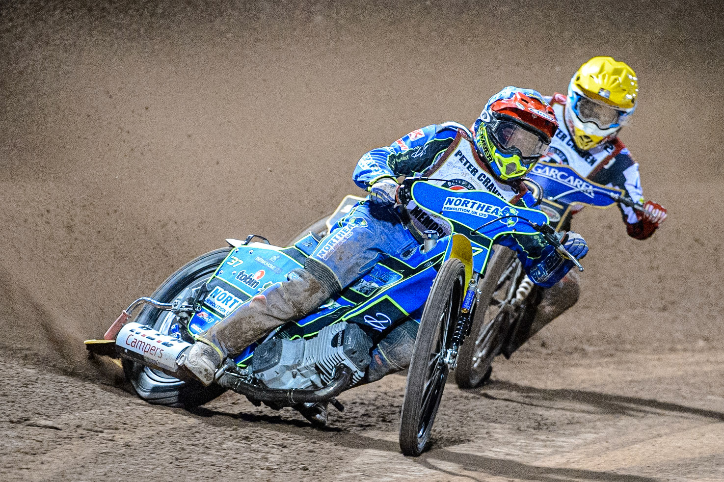 Chris Harris (Blue) leads Robert Lambert  (Yellow) during the Peter Craven Memorial Trophy  at the National Speedway Stadium, Manchester on Monday 3rd April 2023. (Photo: Ian Charles | MI News)