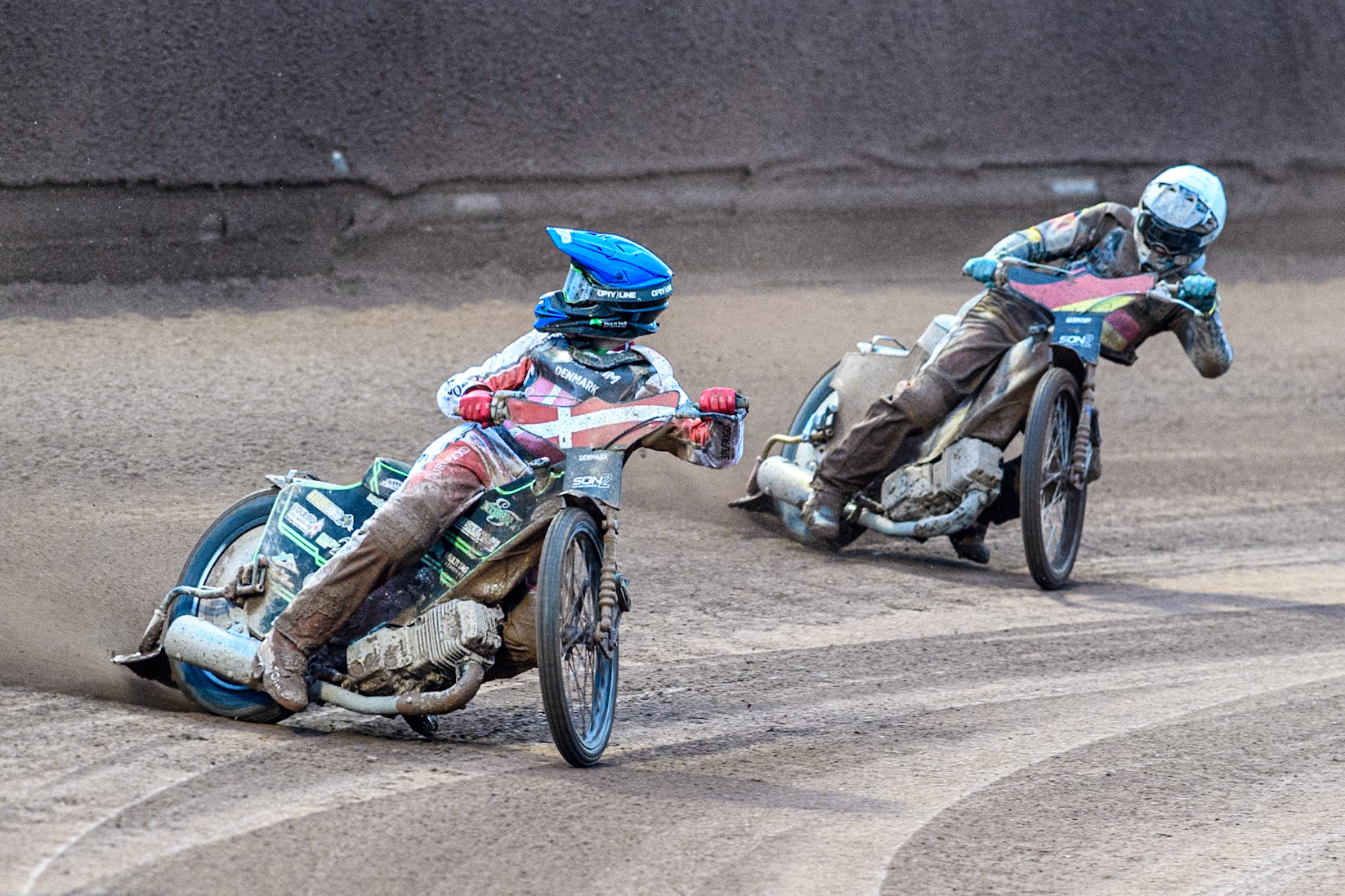 Villads Nagel of Denmark in Blue leading Jonny Wynant of Germany in White during the Monster Energy FIM Speedway of Nations 2 (Under 21) Final at the National Speedway Stadium, Manchester on Friday 12th July 2024. (Photo: Ian Charles | MI News)