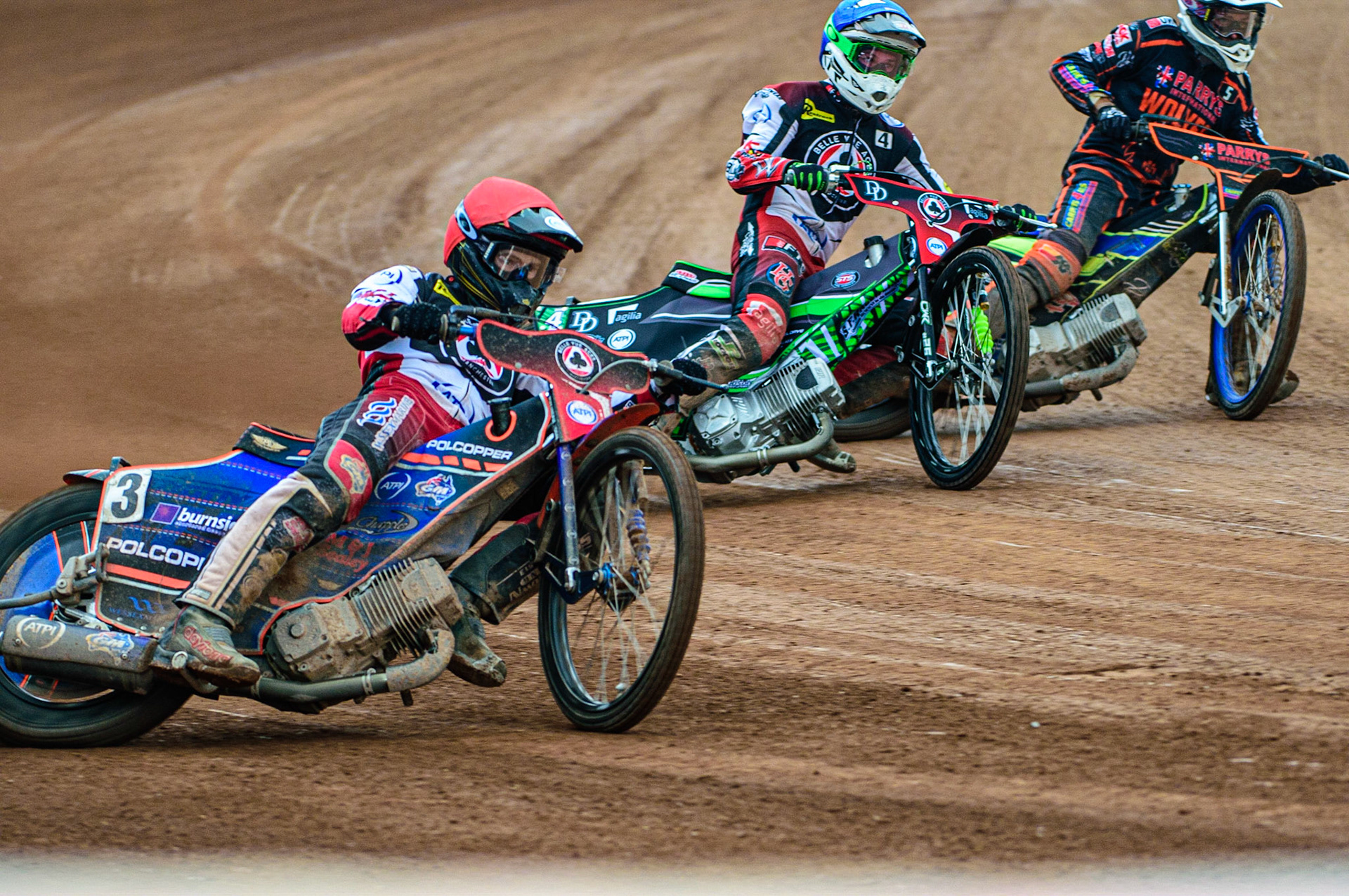 Brady Kurtz  (Red) outside Charles Wright  (Blue) and Nick Morris during the SGB Premiership match between Belle Vue Aces and Wolverhampton Wolves at the National Speedway Stadium, Manchester on Monday 29th August 2022. (Credit: Ian Charles | MI News)
