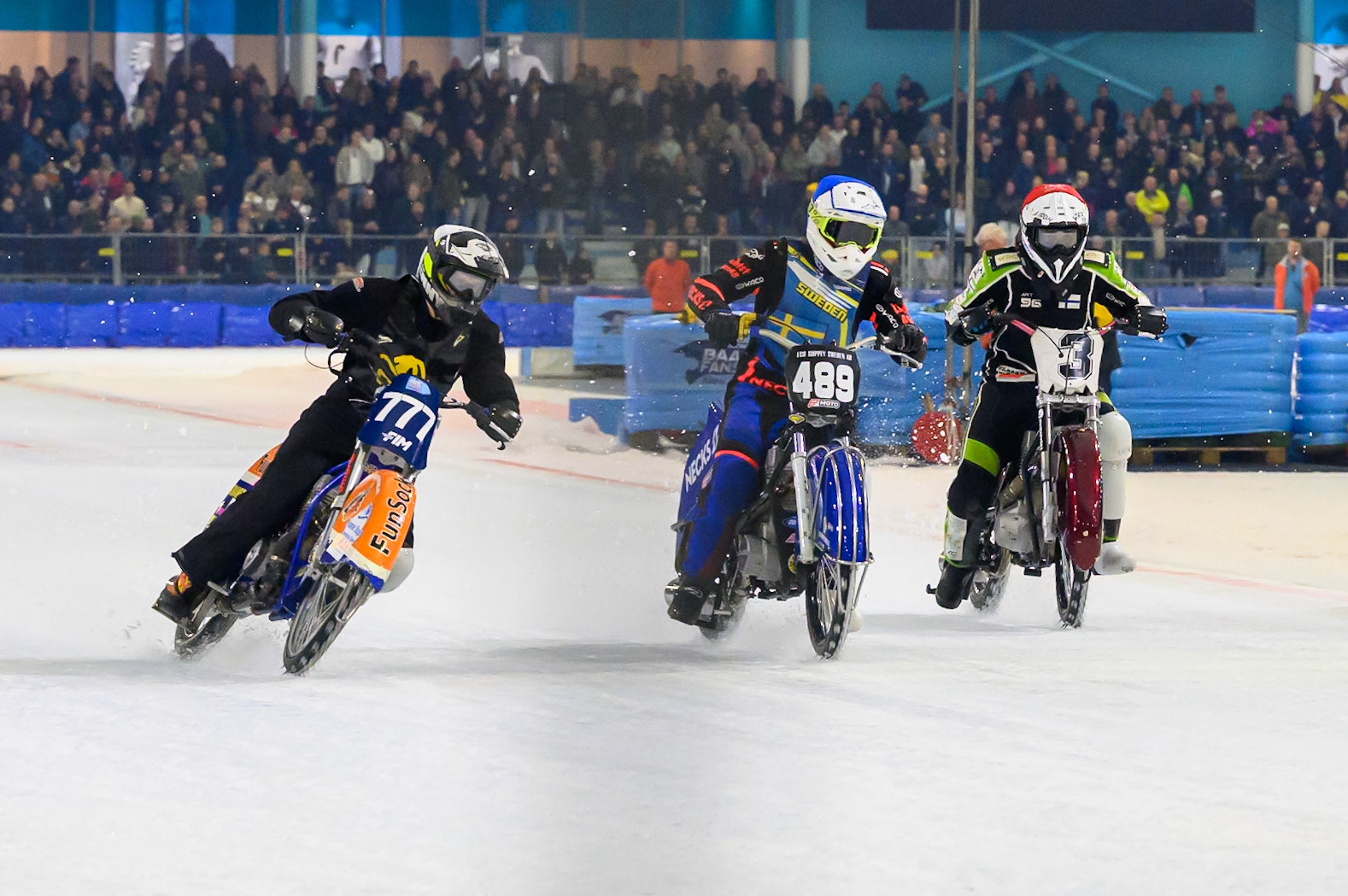 Semi Final 1 start: (L to R) Leon Kramer of The Netherlands  in White, Melwin Björklin of Sweden  in Blue and Arttu Lehtinen of Finland  in Red during the ROELOF THIJS BOKAAL at Ice Rink Thialf, Heerenveen on Friday 10th April 2026.  (Photo: Ian Charles | MI News)