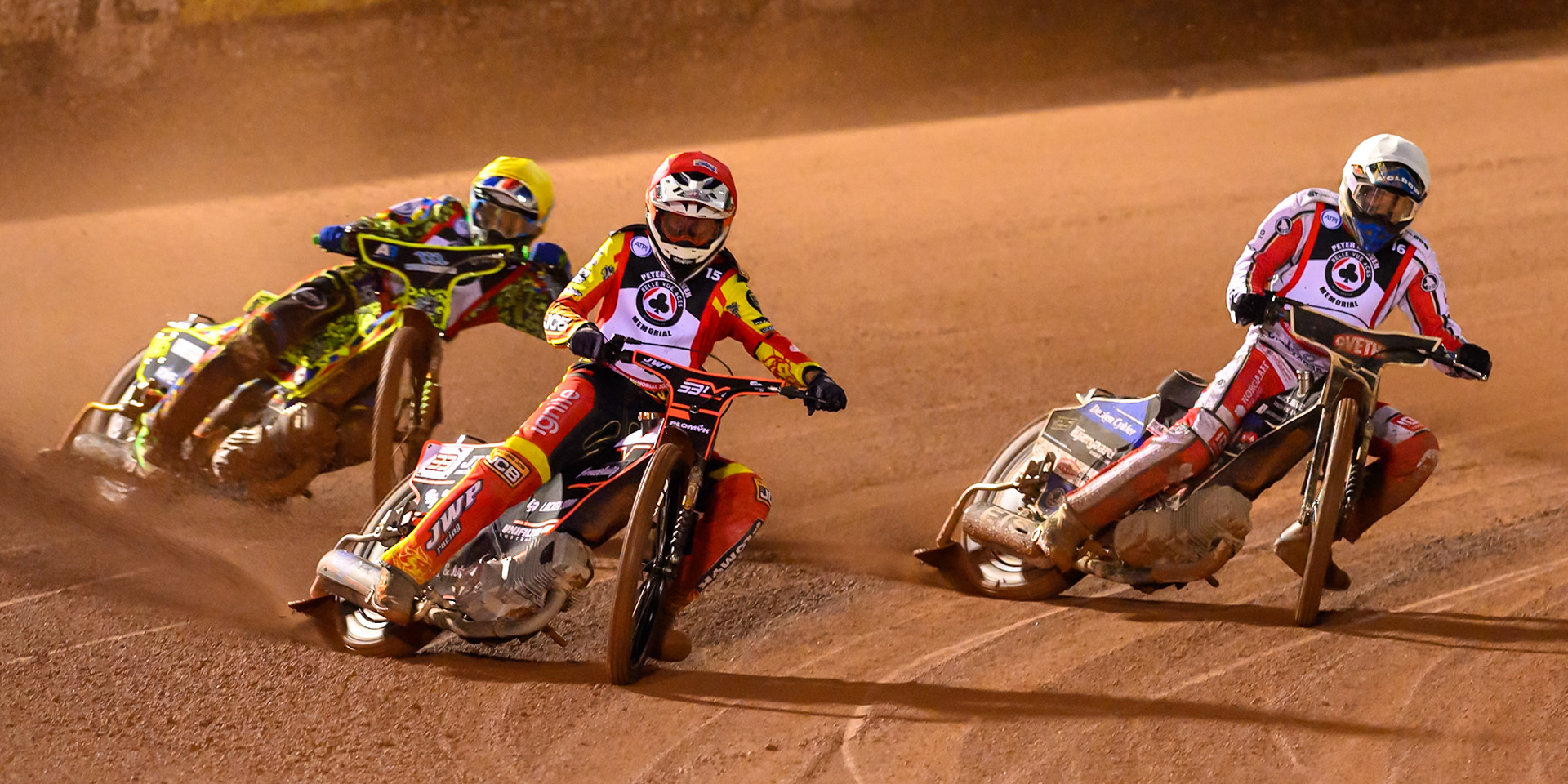 Sam Masters  in Red leading Rasmus Jensen  in White and Reserve Rider Will Cairns   in Yellow during the Peter Craven Memorial Trophy at the National Speedway Stadium, Manchester, on Monday 16th March 2026. (Photo: Ian Charles | MI News)
