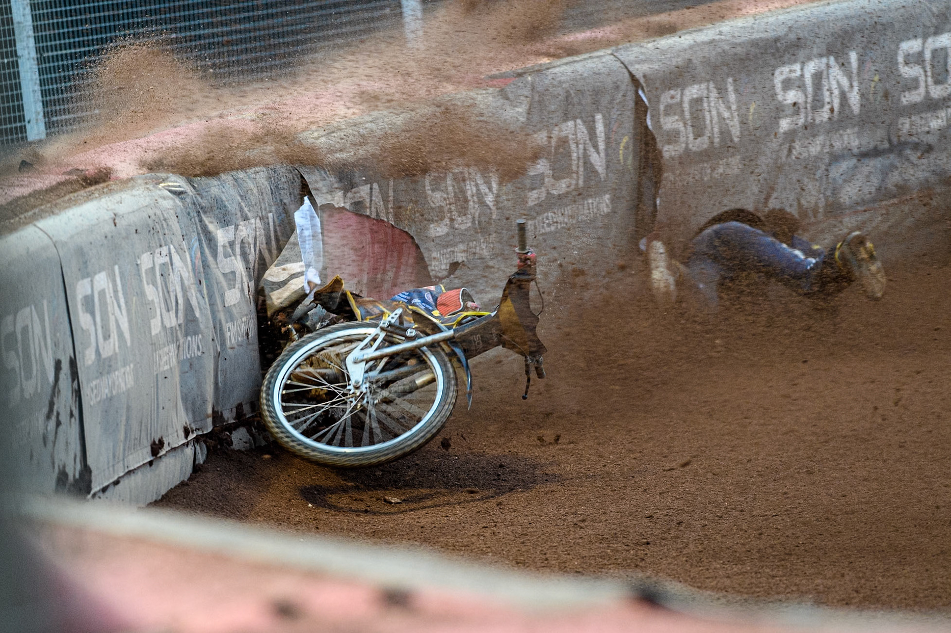 Marko Levishyn of Ukraine in Yellow crashes out of his final heat during the Monster Energy FIM Speedway of Nations Semi-Final 1 at the National Speedway Stadium, Manchester on Tuesday 9th July 2024. (Photo: Ian Charles | MI News)