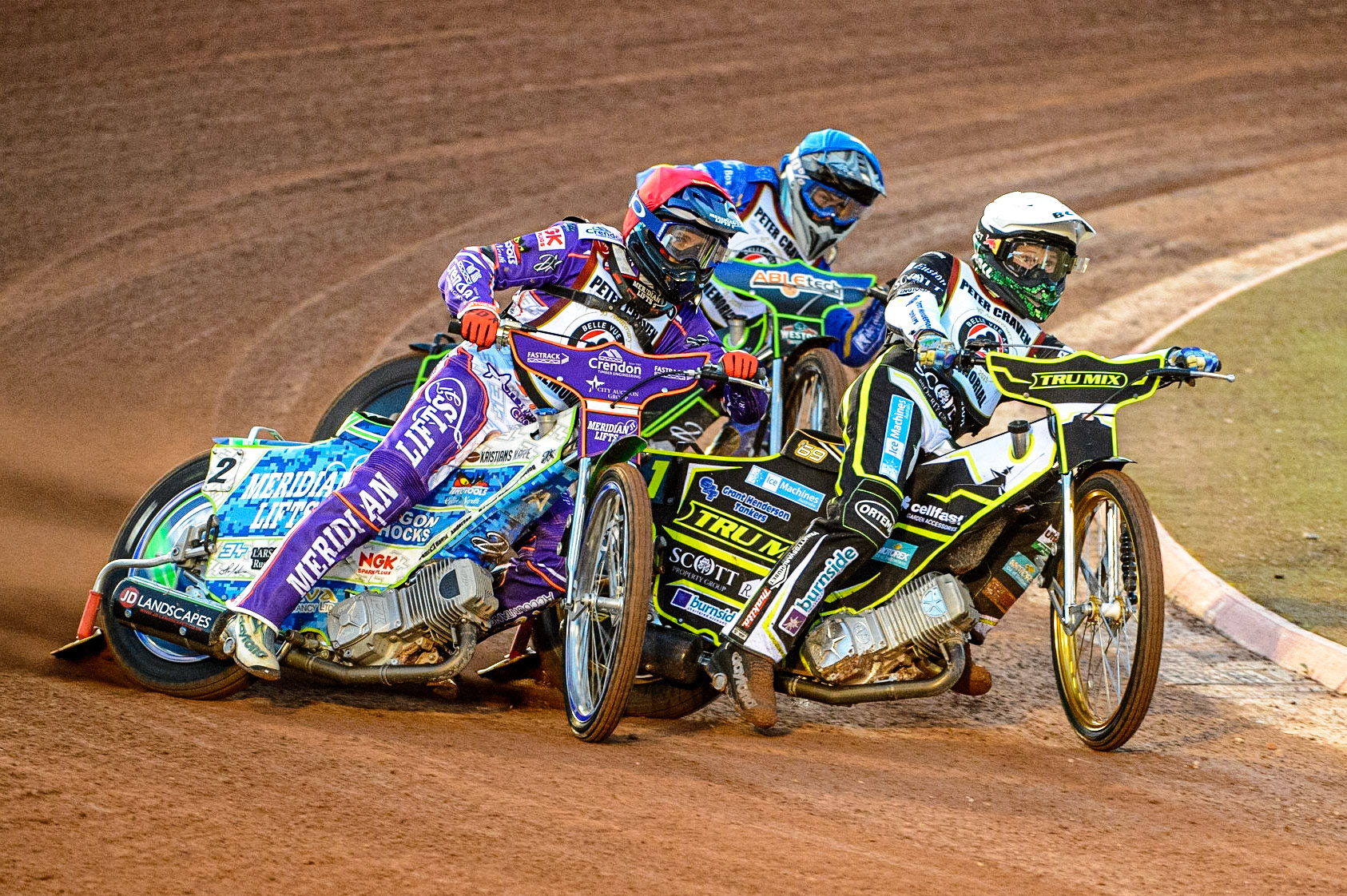 Hans Andersen  (Red) outside Jason Doyle  (White) and Kye Thompson  (Blue) during the Peter Craven Memorial Trophy  at the National Speedway Stadium, Manchester on Monday 3rd April 2023. (Photo: Ian Charles | MI News)