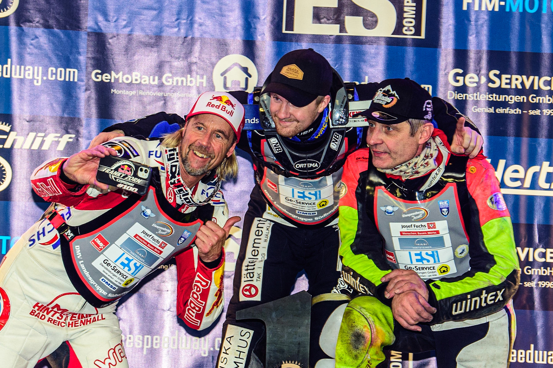 Selfie time for the top 3: (\-r) Franz Zorn (2nd), Martin Haarahiltunen (1st), Harald Simon (3rd) during the Ice Speedway Gladiators World Championship Final 2 at Max-Aicher-Arena, Inzell, Germany on Sunday 19th March 2023. (Photo: Ian Charles | MI News)
