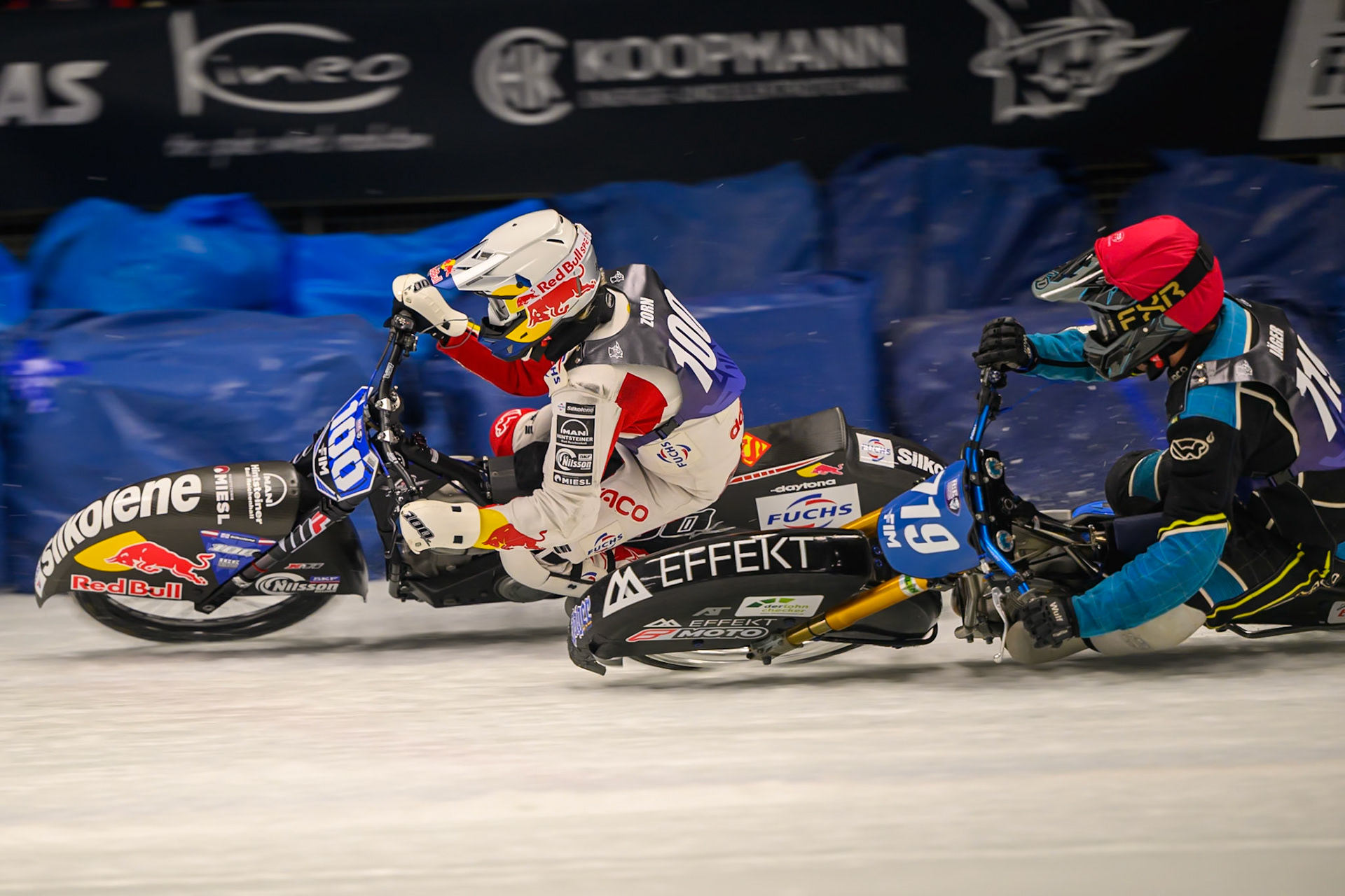 Filip Jäger (719) of Sweden  in Red rides inside Franz Zorn (100) of Austria  in White during the Ice Speedway Gladiators World Championship Final 1 at Max-Aicher-Arena, Inzell on Saturday 14th March 2026. (Photo: Ian Charles | MI News)