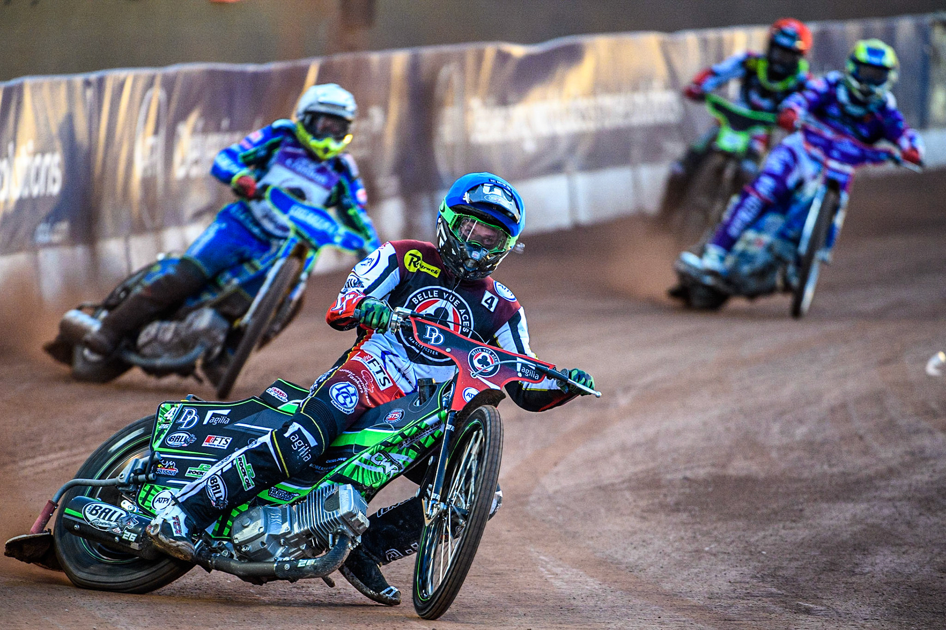 Charles Wright  (Blue) leads Chris Harris   (White), Hans Andersen  (Yellow) and Tom Brennan  (Red) during the SGB Premiership match between Belle Vue Aces and Peterborough at the National Speedway Stadium, Manchester on Monday 24th April 2023. (Photo: Ian Charles | MI News)