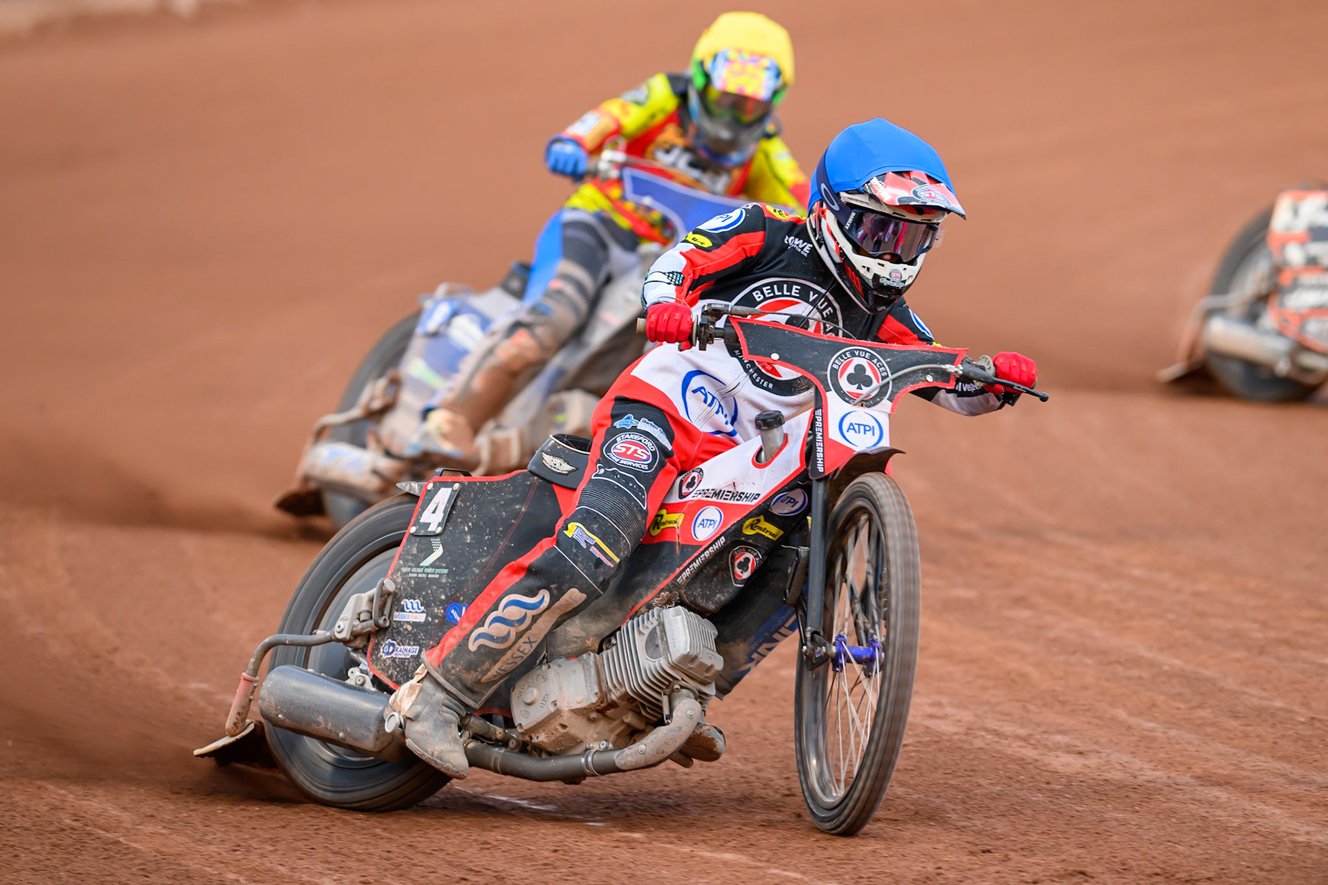Zach Cook of Belle Vue Aces in Blue leading Jonas Jeppesen Guest rider for Leicester Lions in Yellow during the Rowe Motor Oil Premiership match between Belle Vue Aces and Leicester Lions at the National Speedway Stadium, Manchester on Monday 3rd August 2026. (Photo: Ian Charles | MI News)